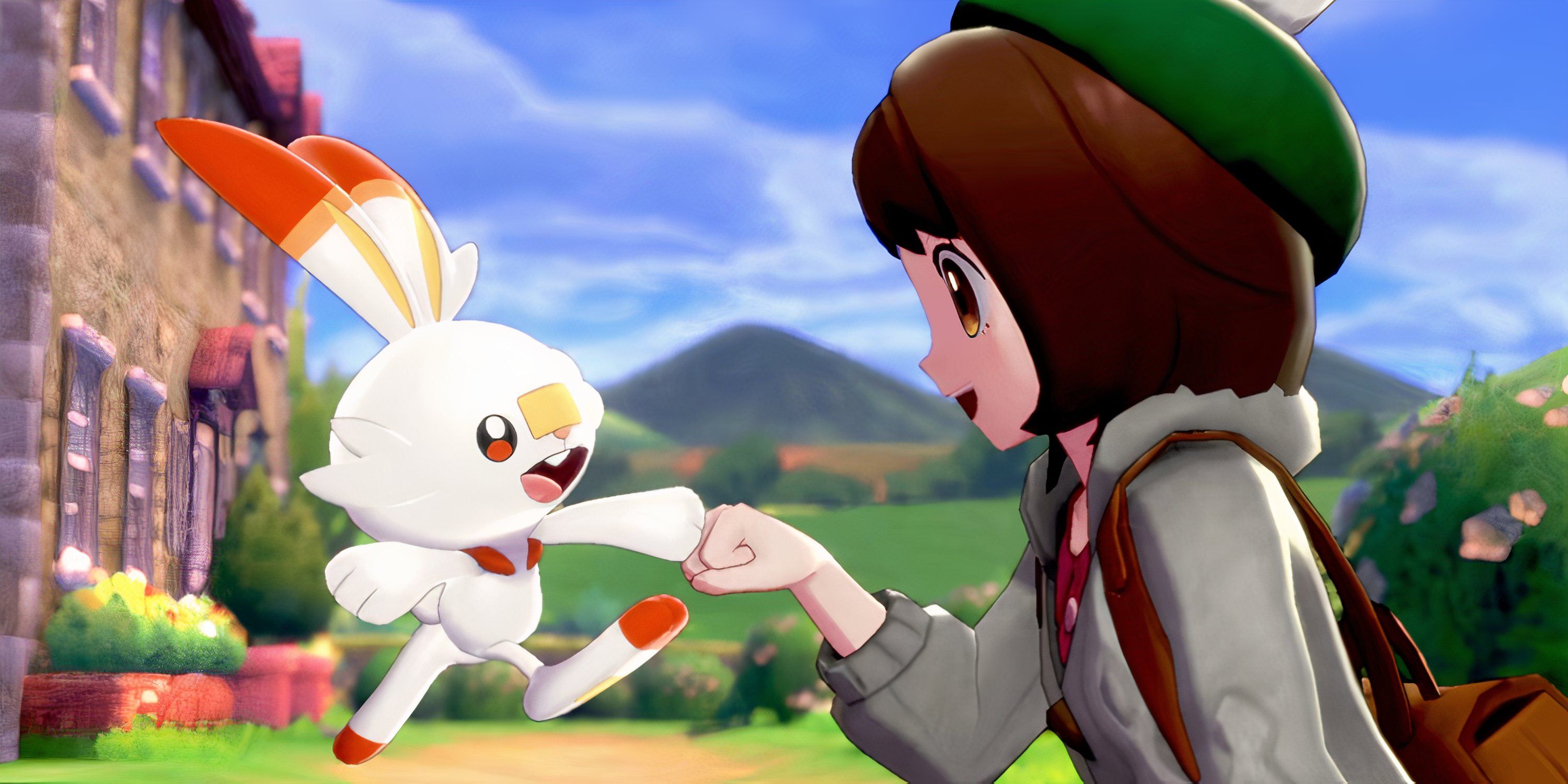  Scorbunny jumps and pounds fists with Pokemon Trainer Gloria in Pokemon Sword & Shield.