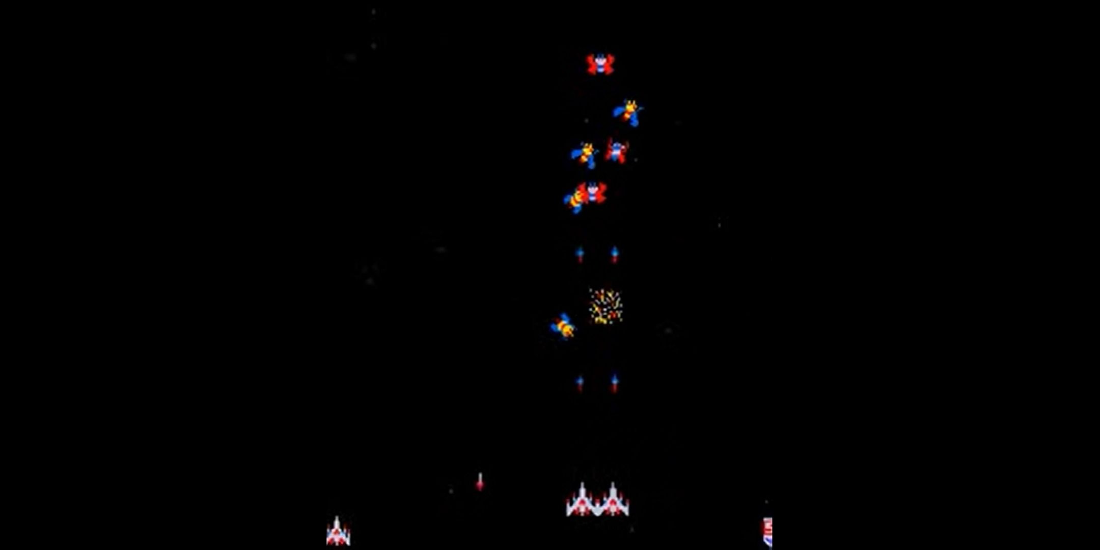 Twin ships shooting in Galaga.