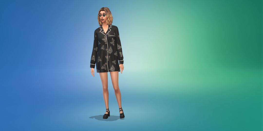 A woman models a pair of moth covered pajamas in the Sims 4.