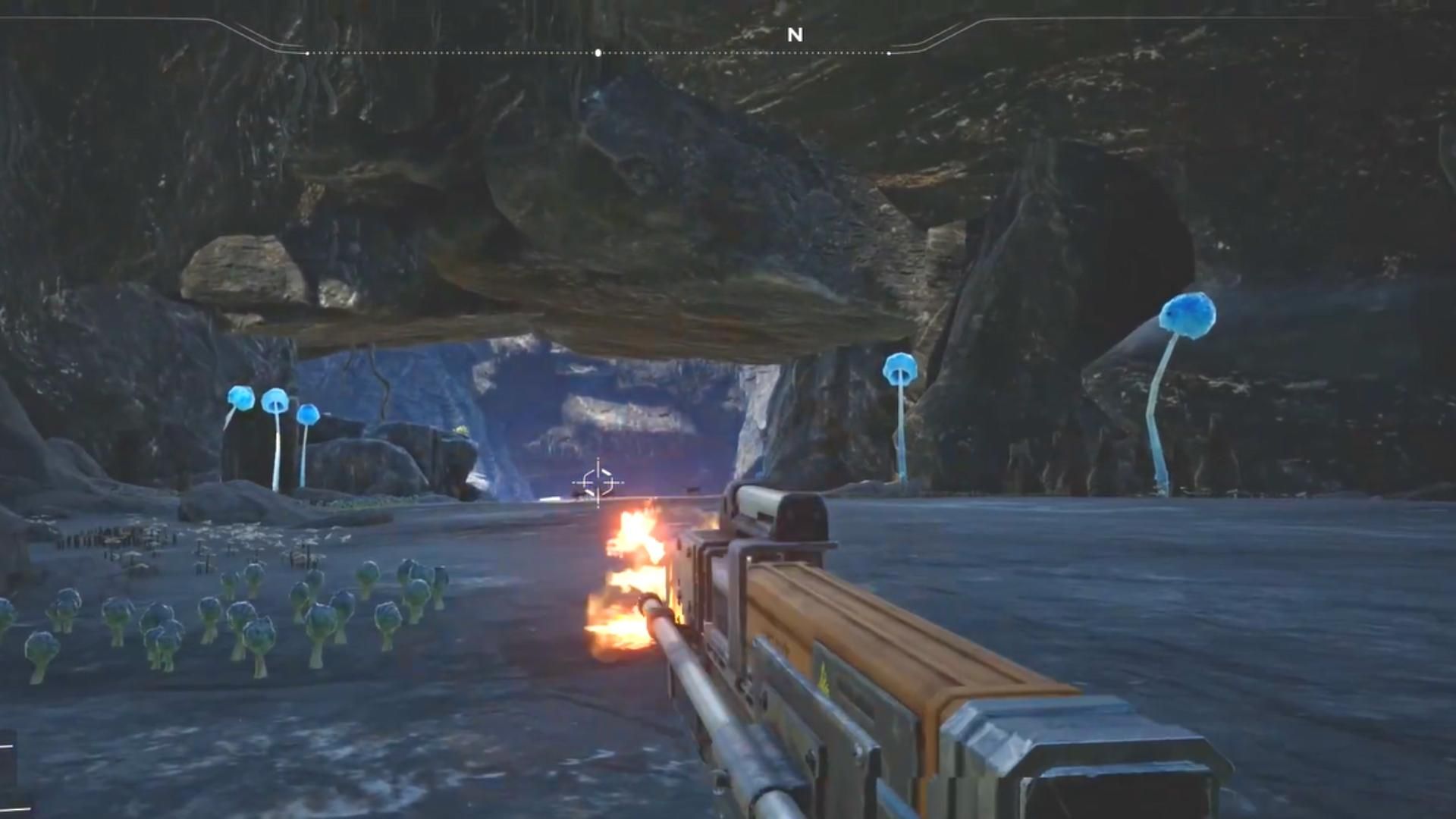 Character holding a rifle inside the Fungus Cave in Satisfactory.