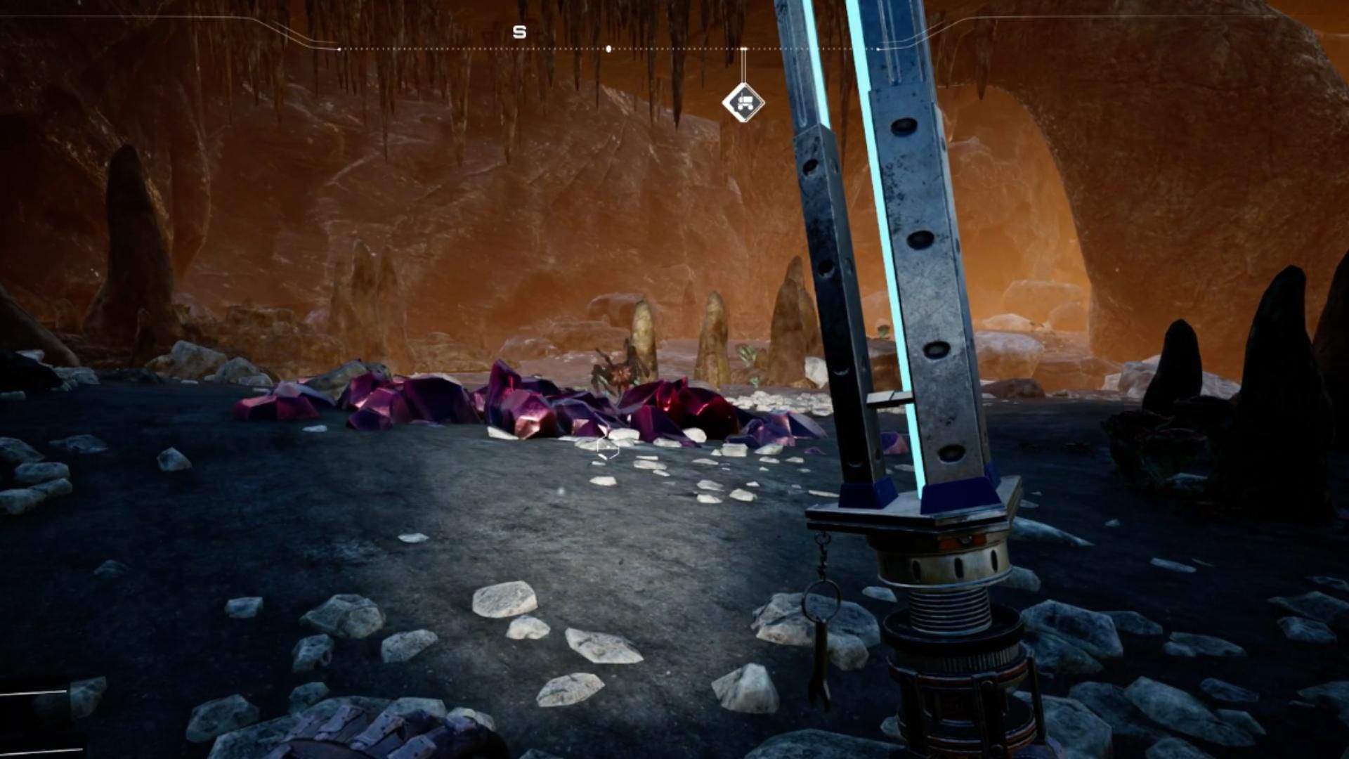 Character holding a Xeno Basher inside the Crystal Cave in Satisfactory.