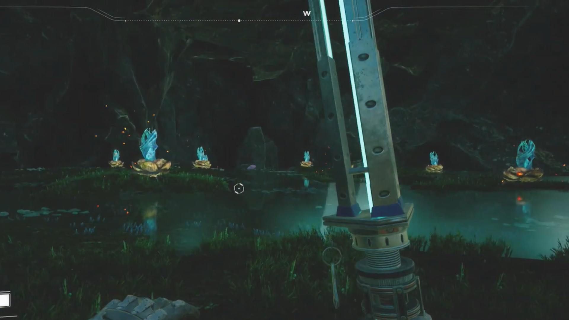 Character holding a Xeno Basher inside the Swamp Cave in Satisfactory.