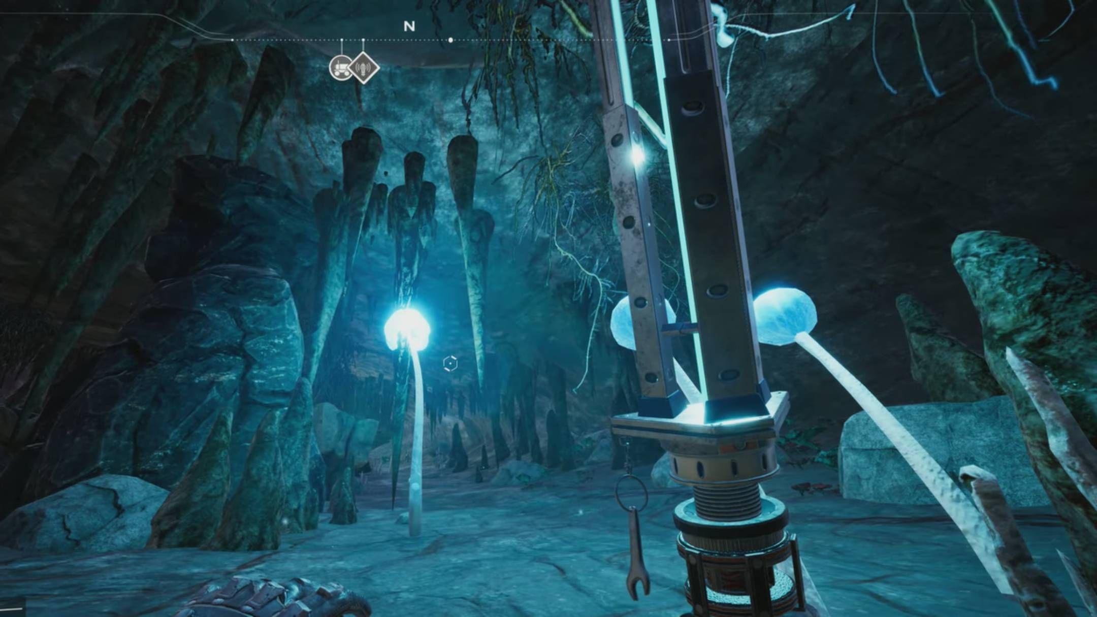 Character holding a Xeno Basher inside the Uranium Cave In Satisfactory.