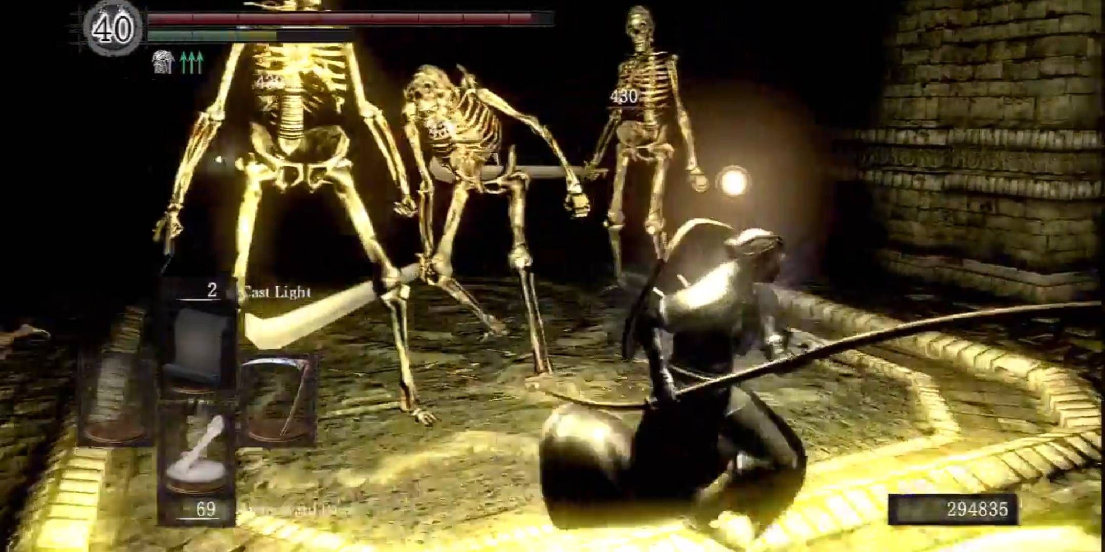 Fighting Giant Skeletons on the way to the Large Divine Ember in Dark Souls Remastered.