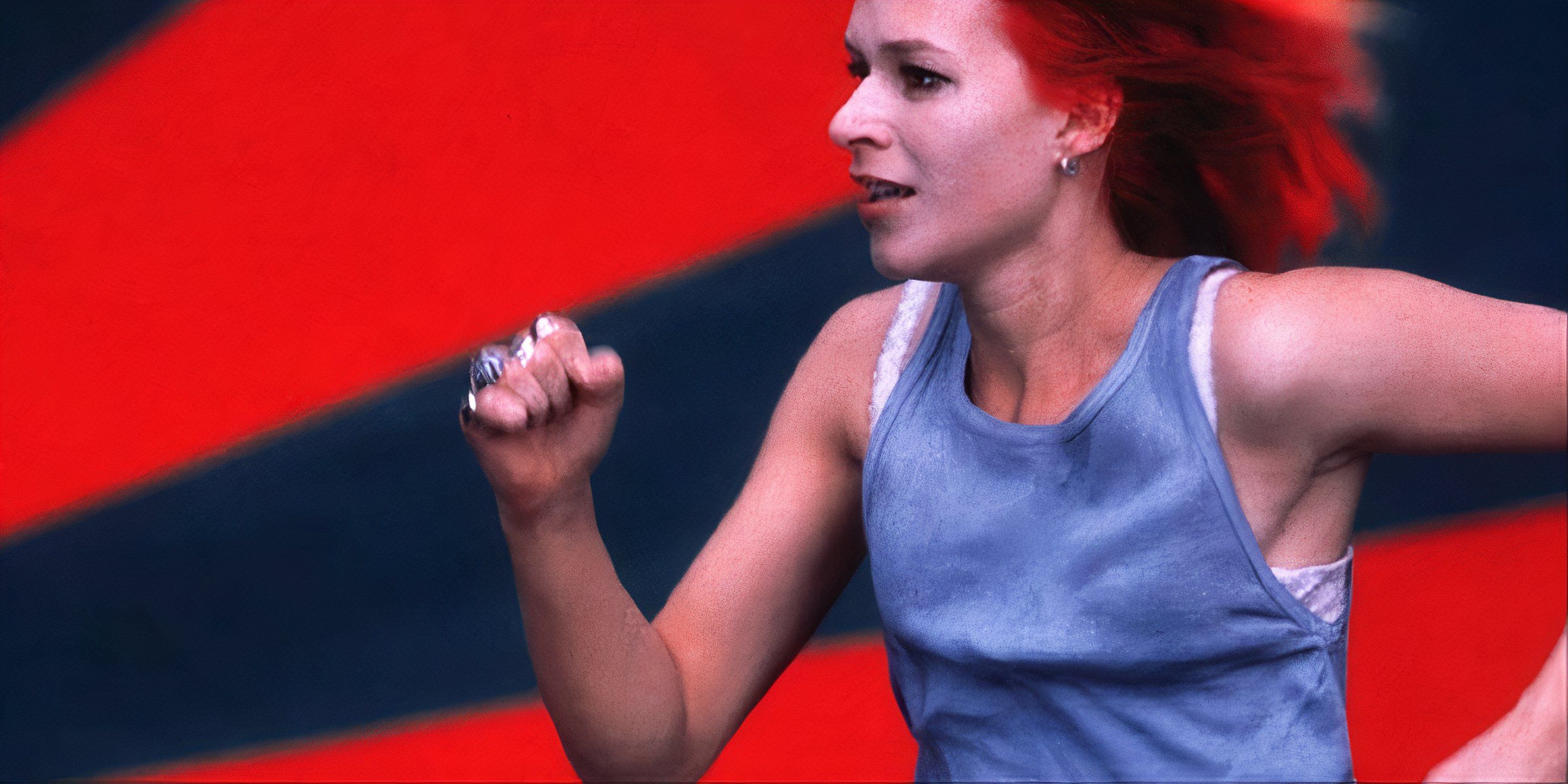 Franka Potente running as her character Lola in Run Lola Run.