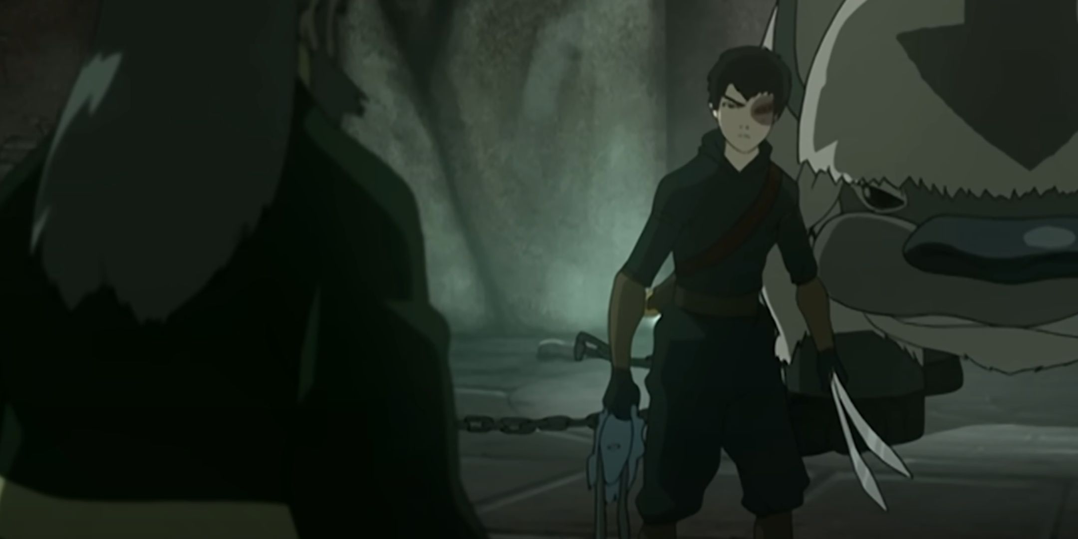 Zuko stands before an imprisoned Appa.