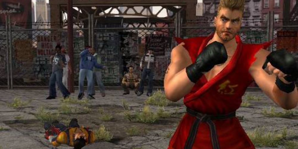 Tekken Tag Tournament screenshot of Paul wearing red GI with fists up