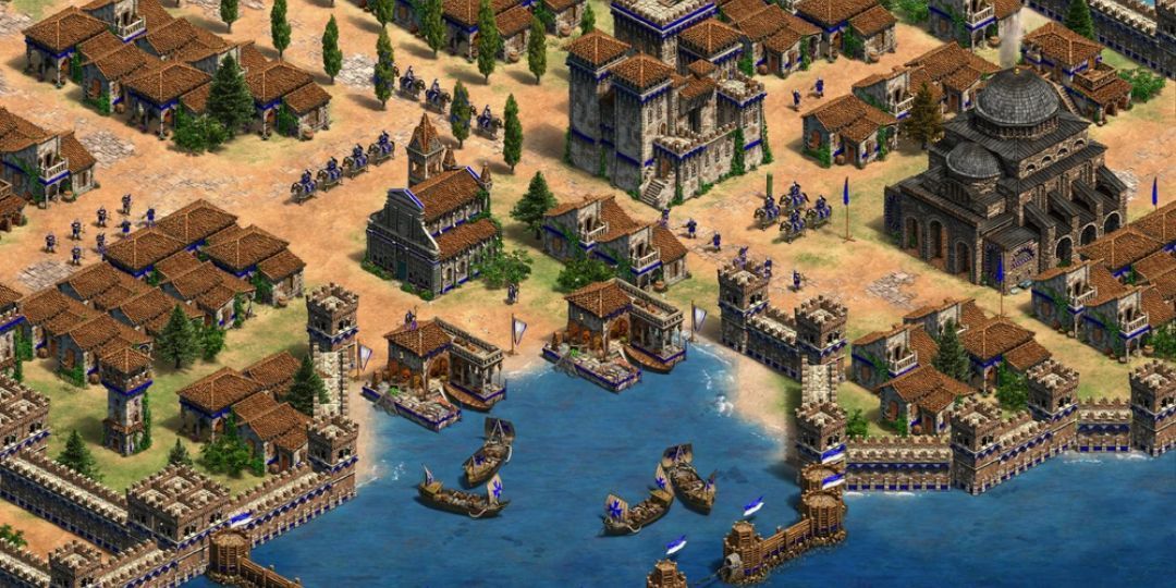 A Byzantine town sits by an ocean in Age Of Empires 2.