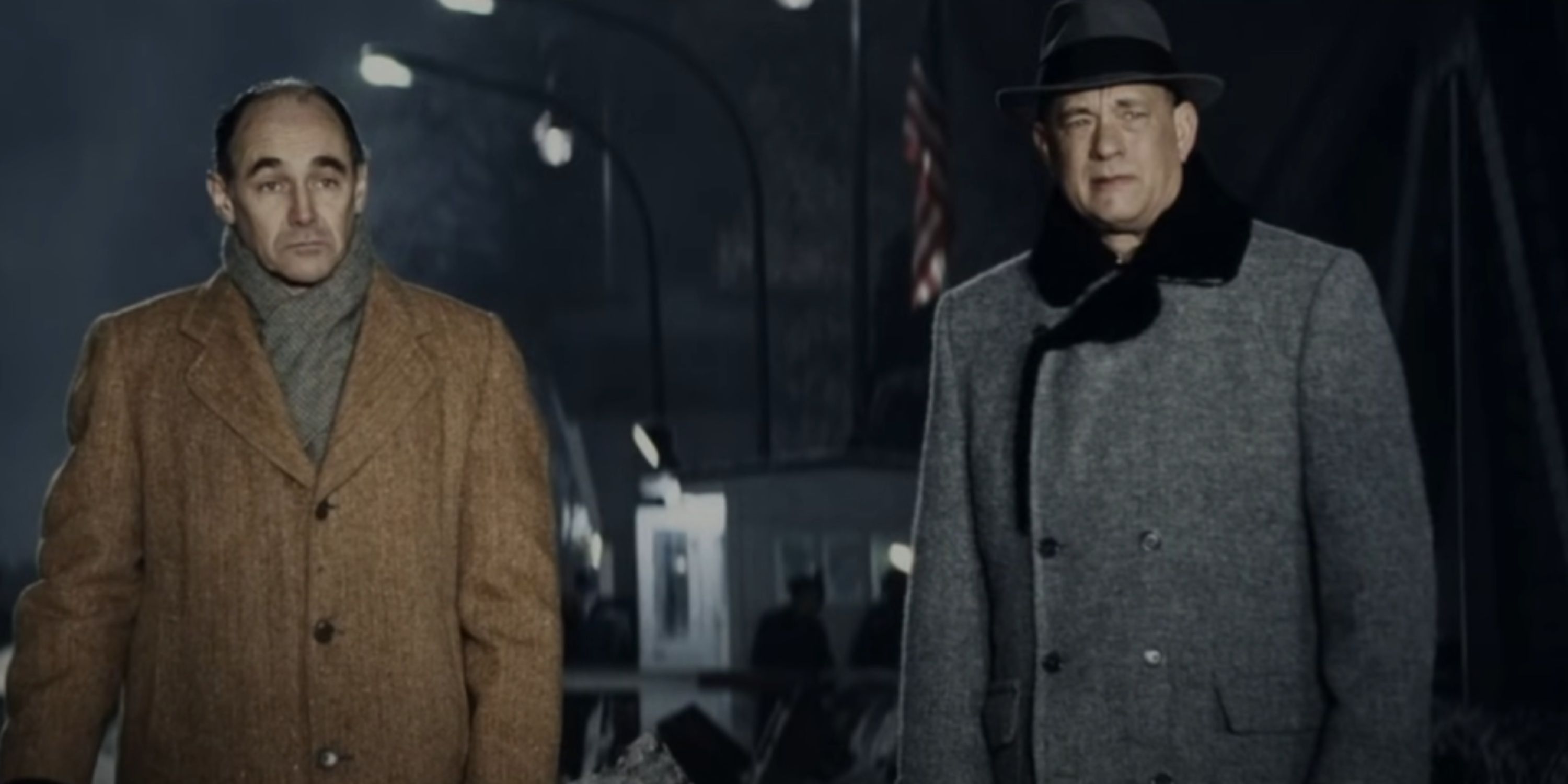 Rudolf Abel and James Donovan stand on the bridge for the exchange.