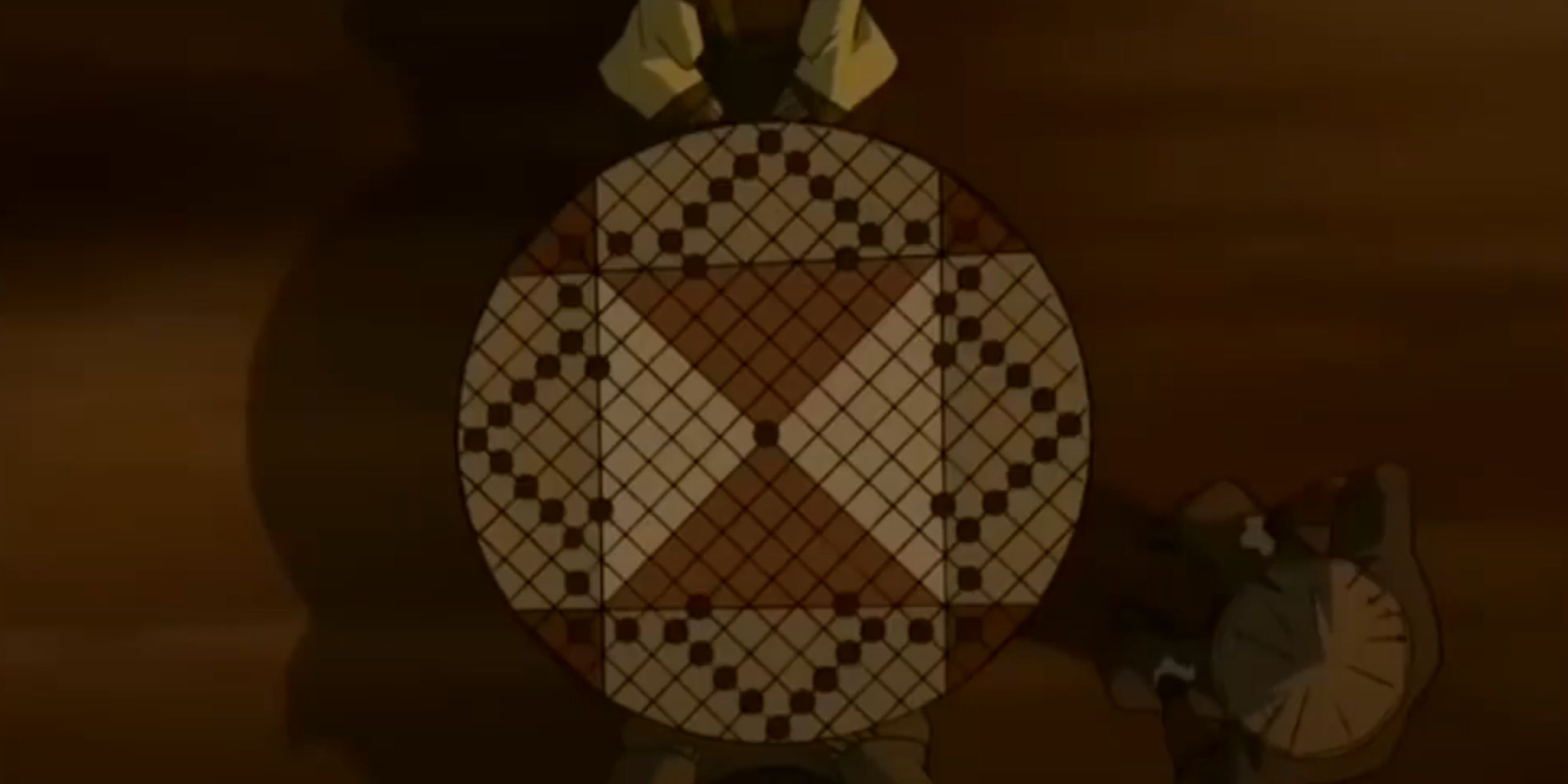 The pai sho table with the symbol of the White Lotus on its surface.