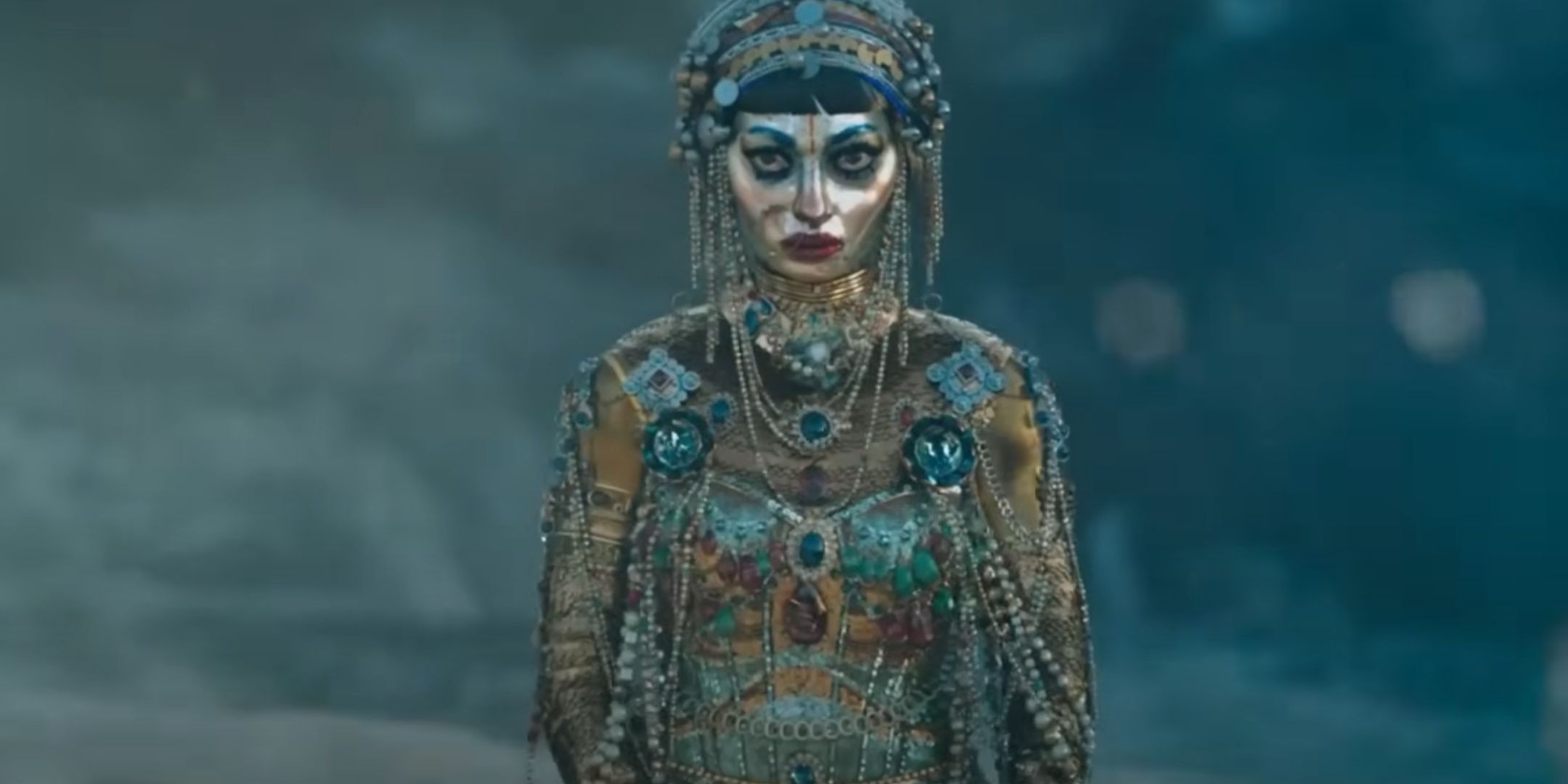 The dancer from the Jibaro episode standing still.