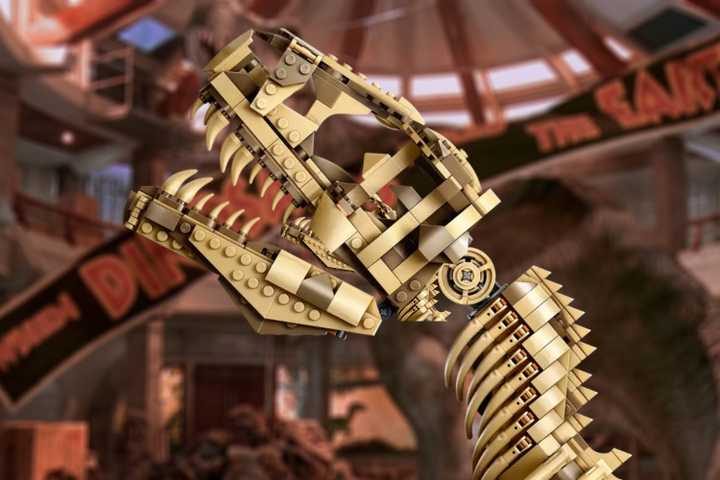 lego jurassic park t-rex skeleton set on a blurred jurassic park background.