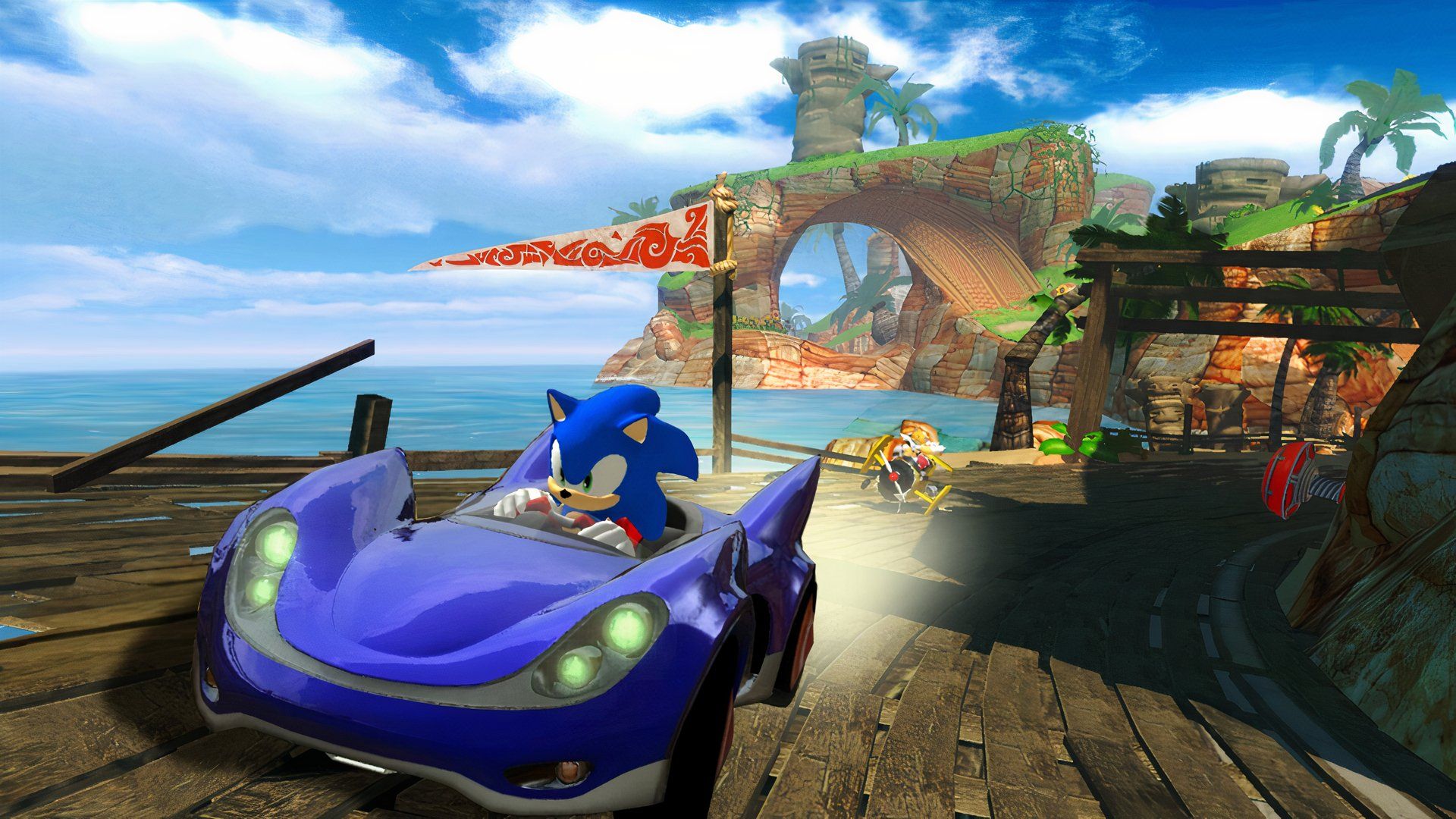 Sonic driving his signature blue car in Sonic & Sega All-Stars Racing.