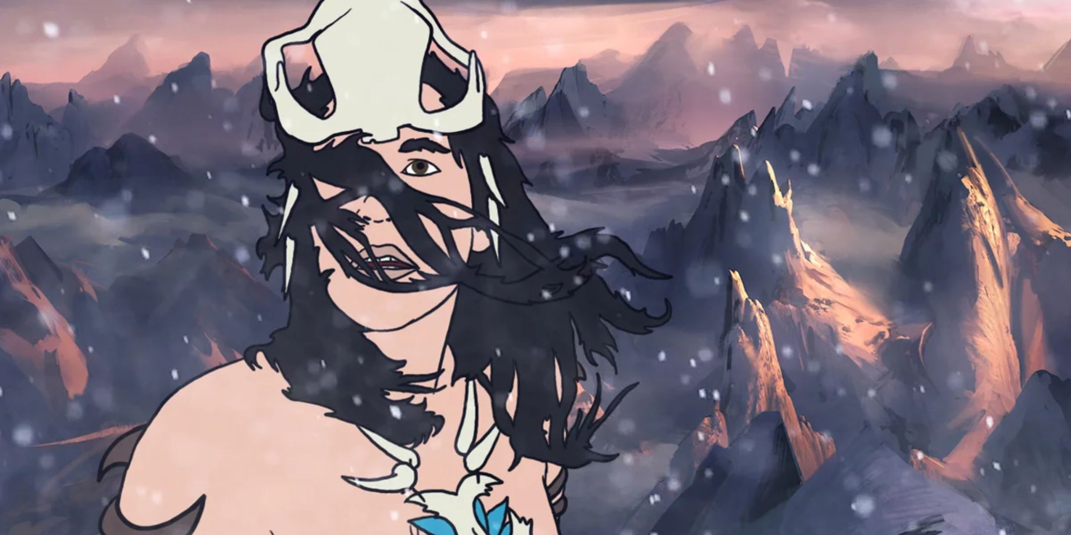 A lone traveler looks up through his hair in the mountains. 