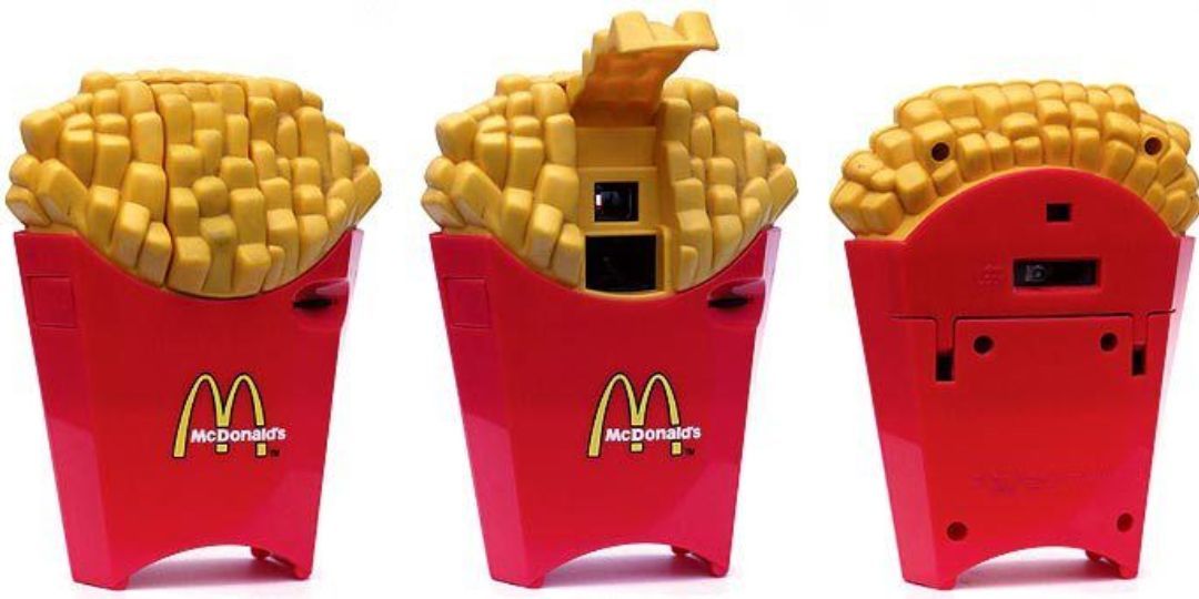 A McDonalds French Fry camera stands against a white background.