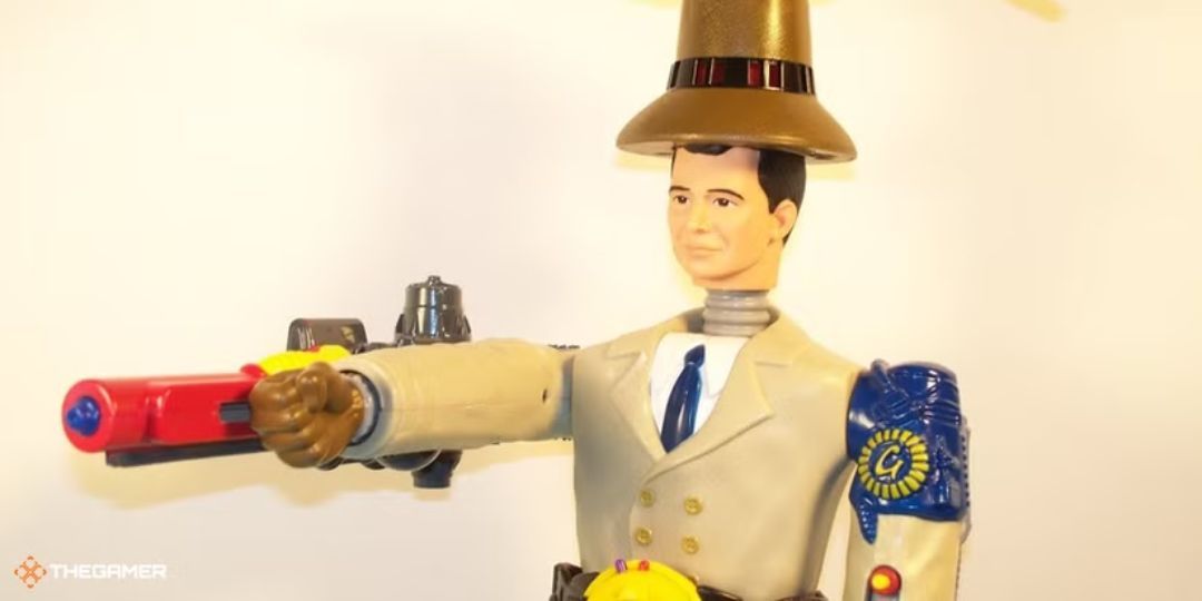 An inspector gadget toy aims at the camera.