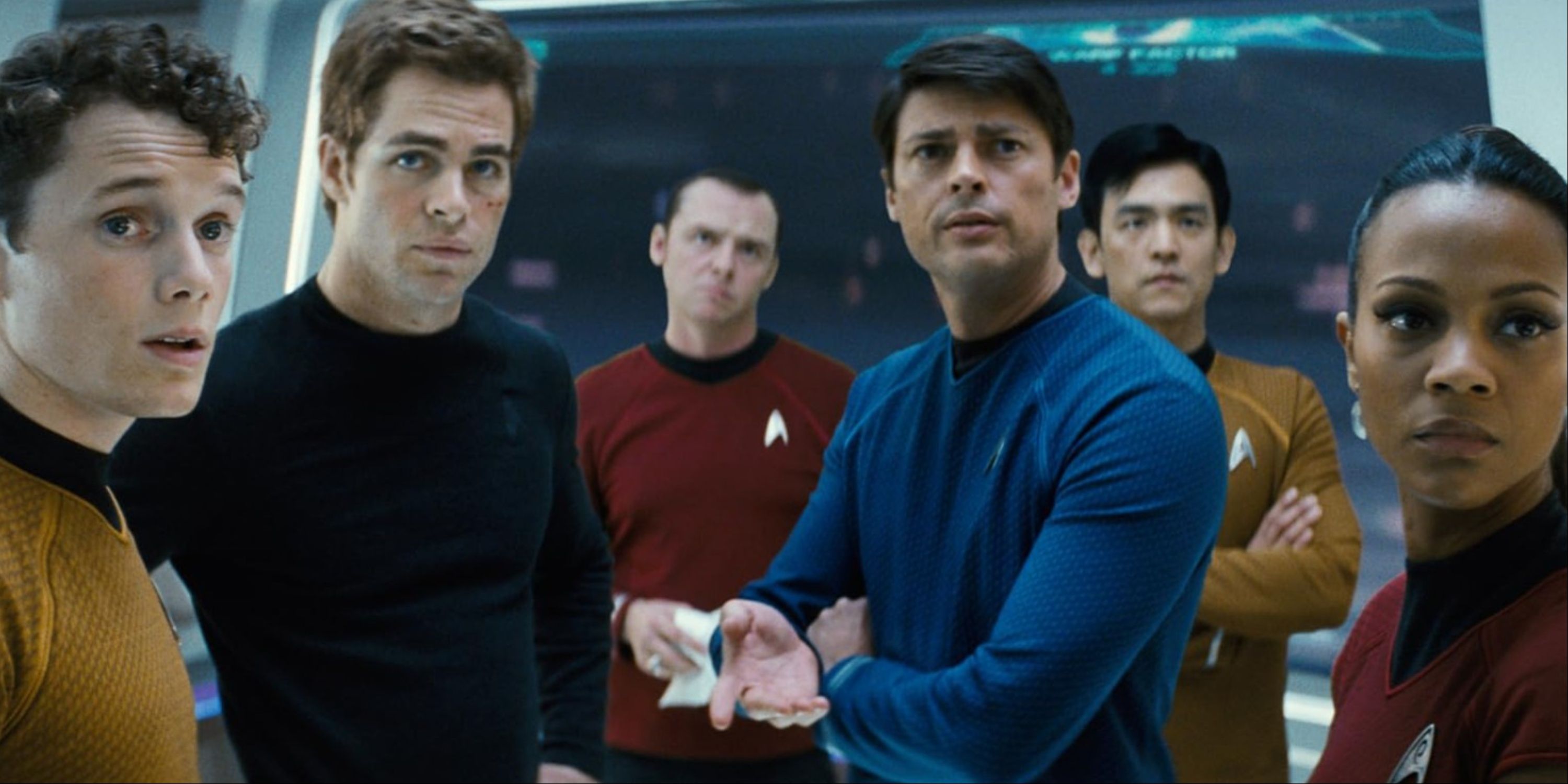 Anton Yelchin, Chris Pine, Simon Pegg, Karl Urban, John Cho, and Zoe Saldana in Star Trek (2009) as the main crew.
