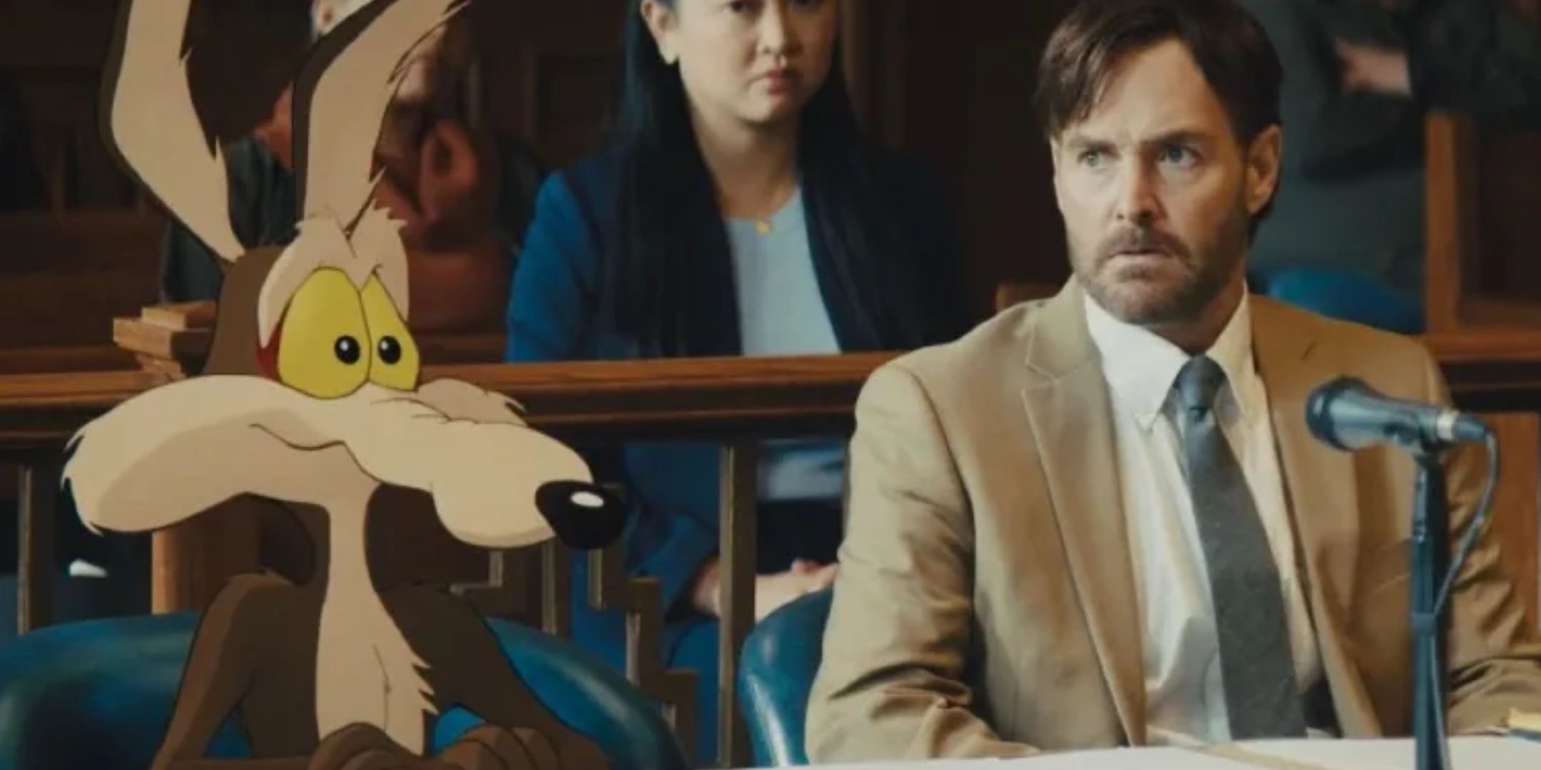 A still from Coyote vs. Acme, showing the animated Wile E. Coyote in a real life courtroom