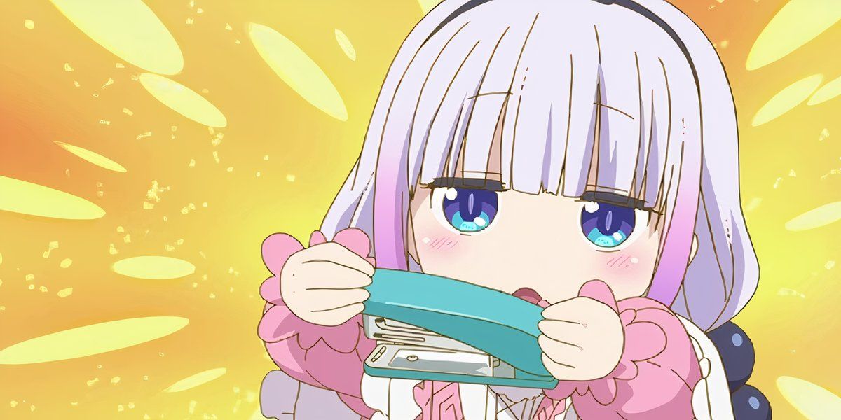 Kanna holds out a stapler in Miss Kobayashi's Dragon Maid.