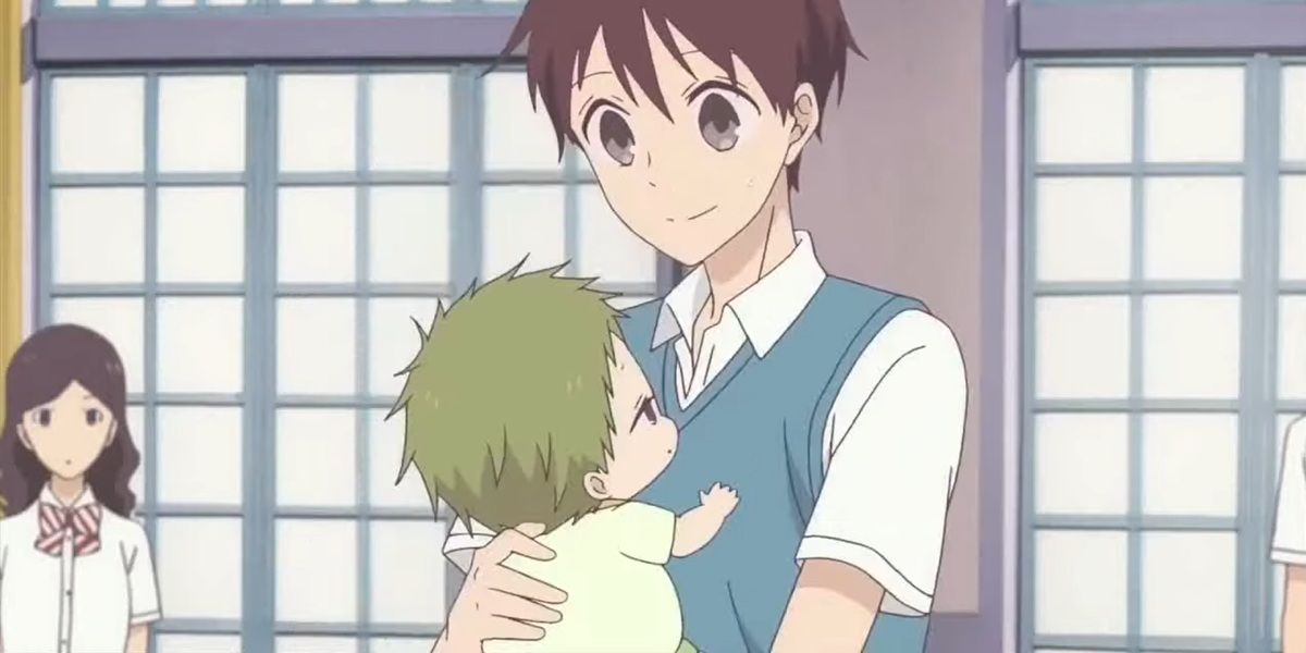 Kotaro being held by his brother in School Babysitters.