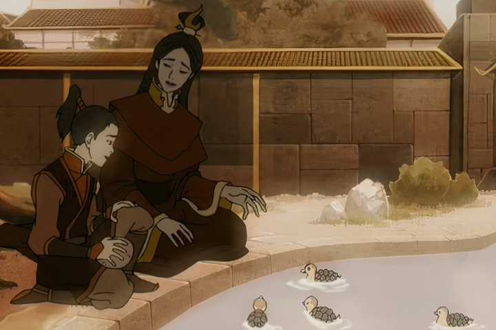 Zuko and Ursa feeds the turtleducks in the palace pond.