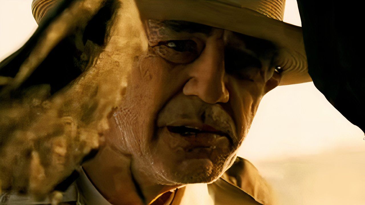R. Lee Emery peers into the wreckage of a car in The Texas Chainsaw Massacre: The Beginning.