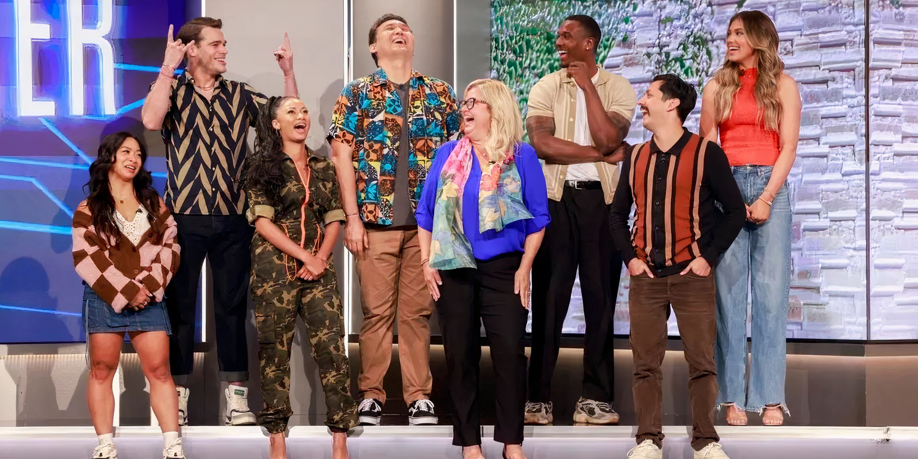 Some of the contestants from Big Brother 26 stand on stage together.