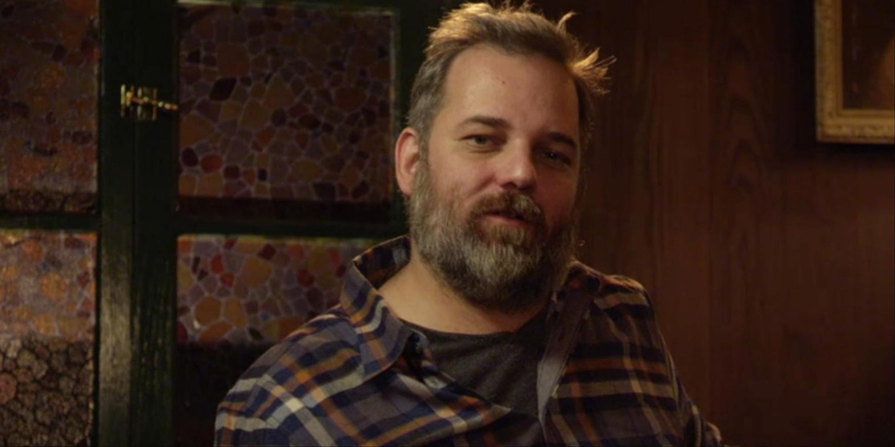A close-up of Dan Harmon playing a character in Drunk History.