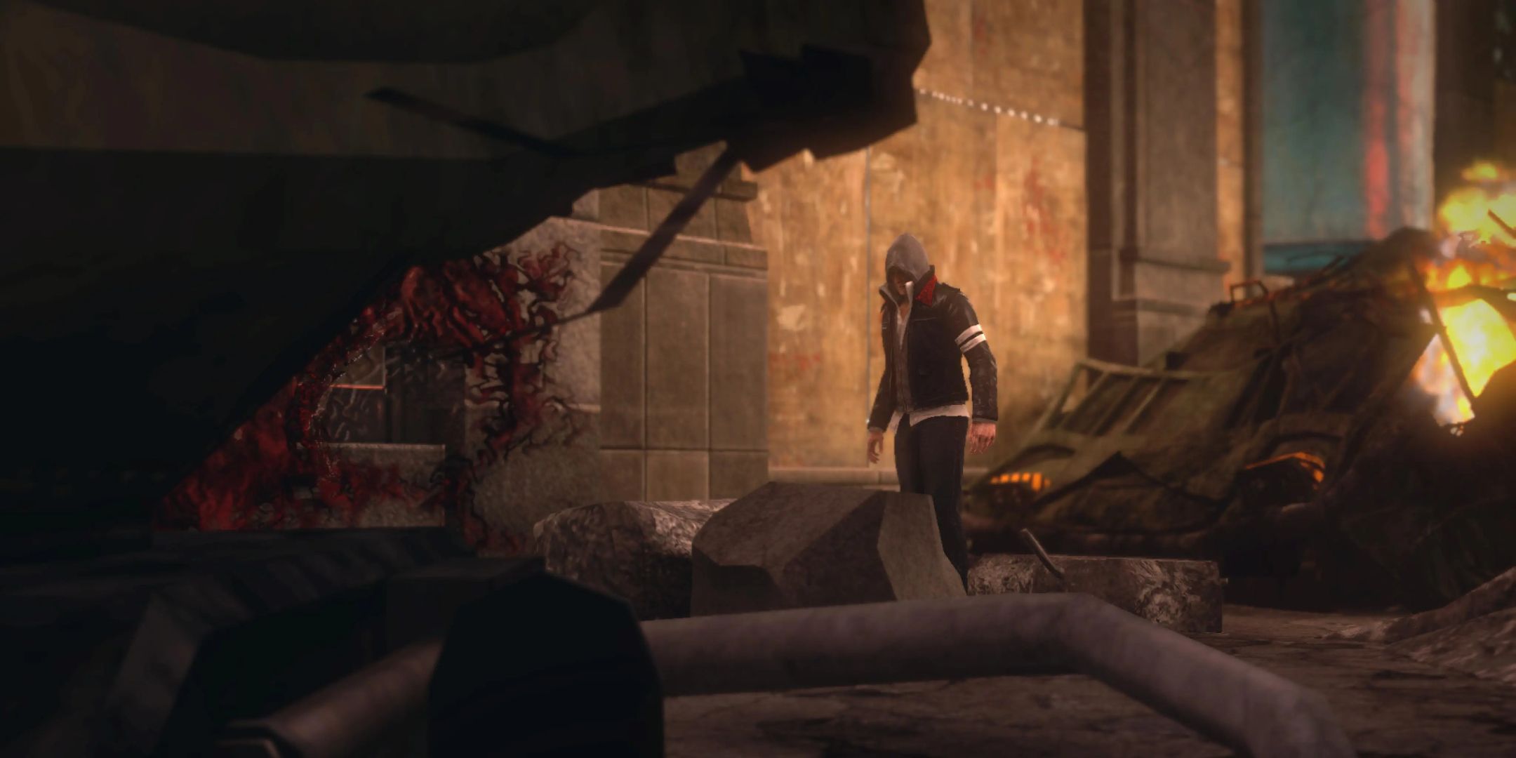 Alex Mercer stood among wreckage in Prototype 2.