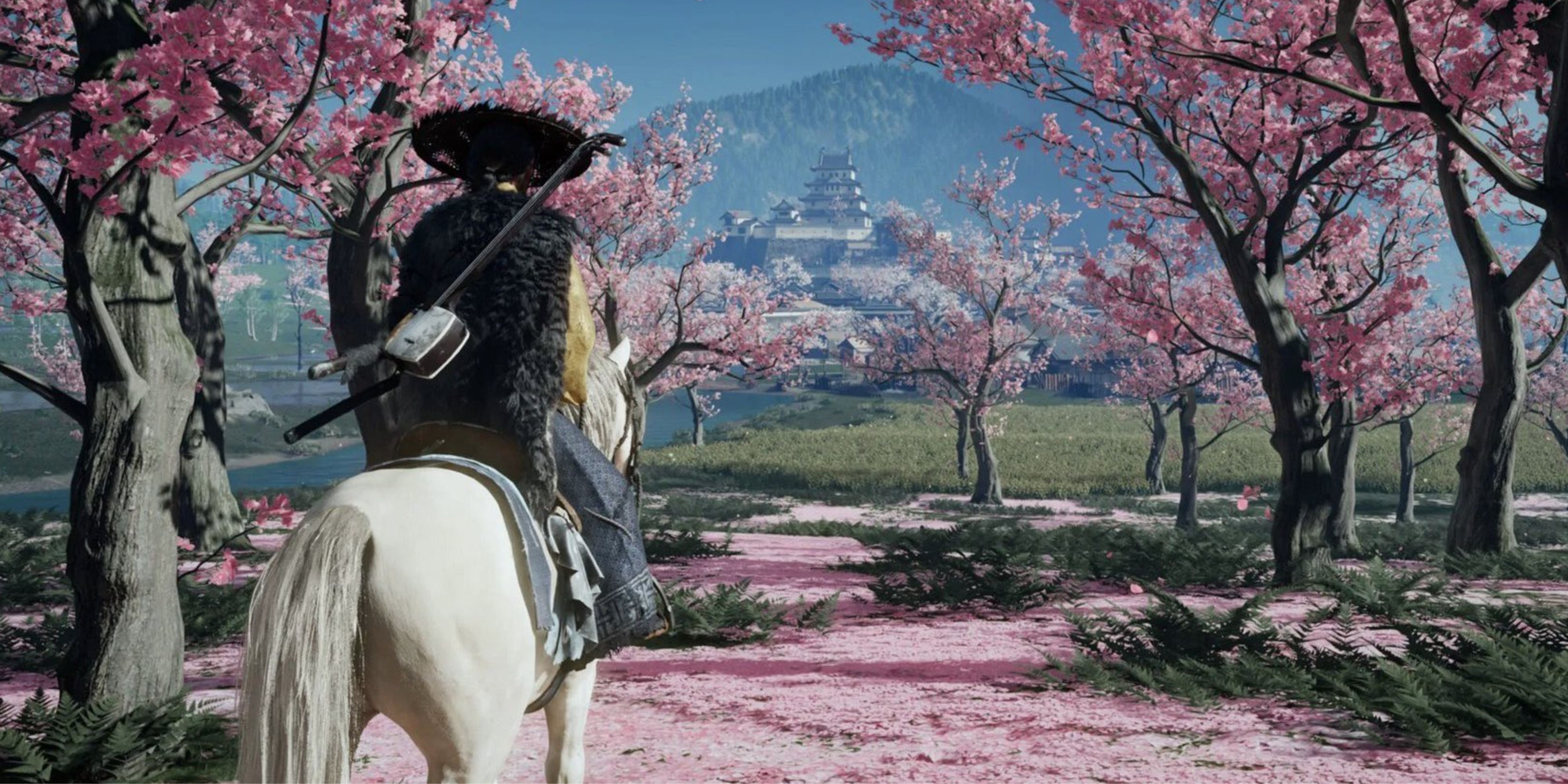 Atsu surrounded by cherry blossoms in Ghost of Yotei