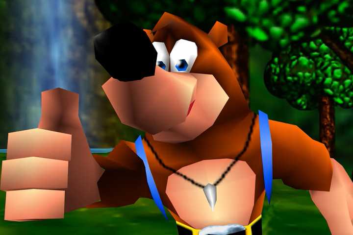 Banjo looking at the screen with a thumbs up