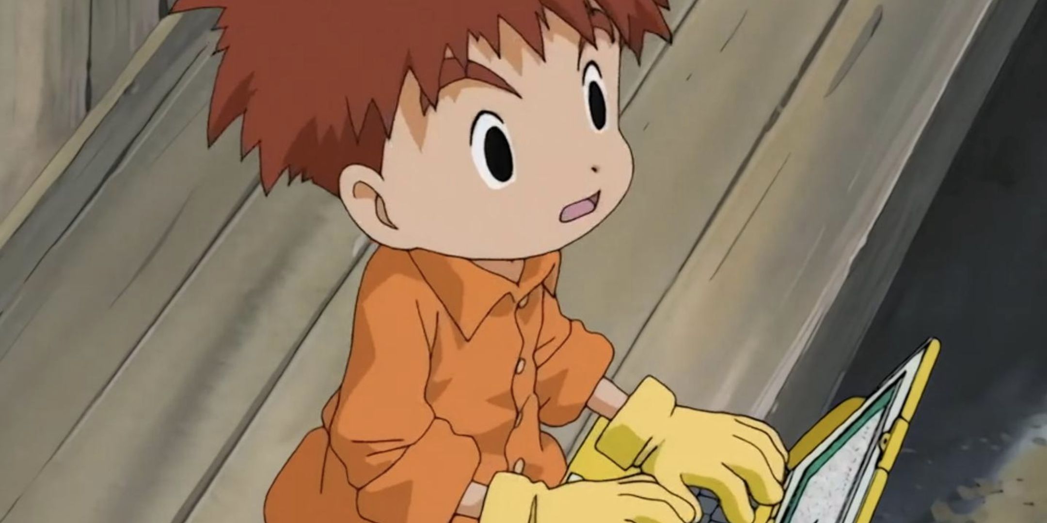 Izzi looking up from his computer at the strange weather in Digimon.