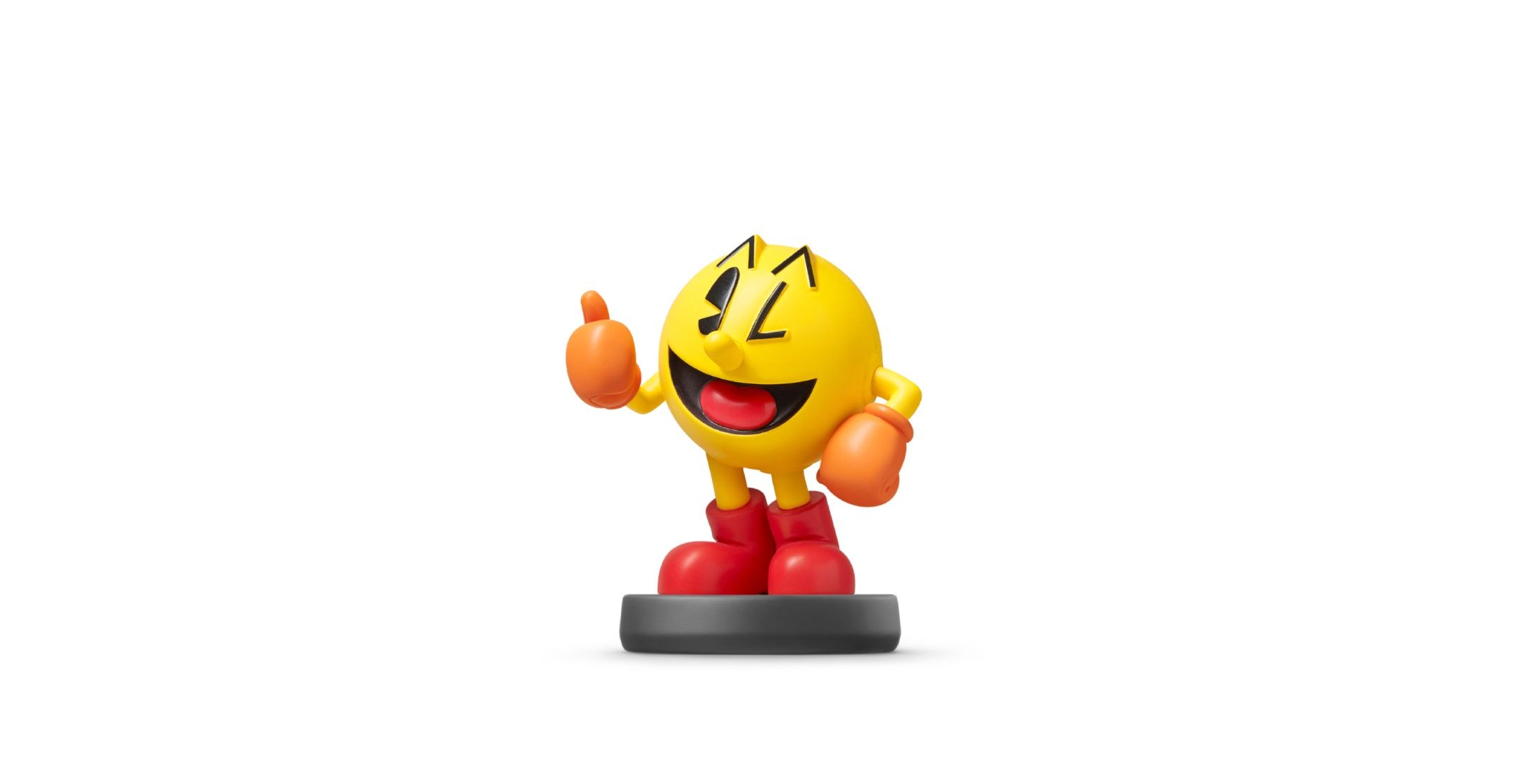 Pac man amiibo on a white background.