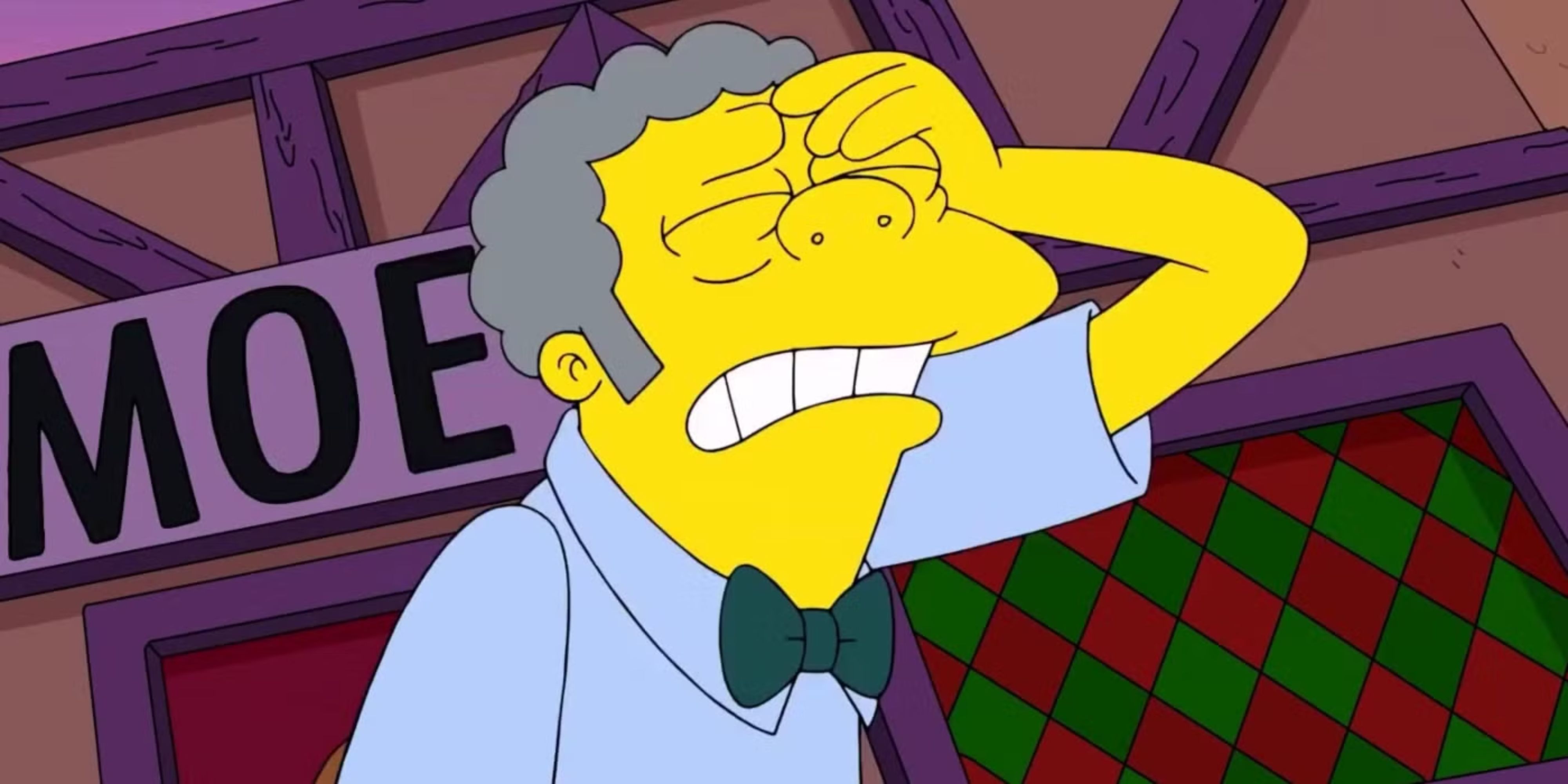 Moe holding his face in The Simpsons