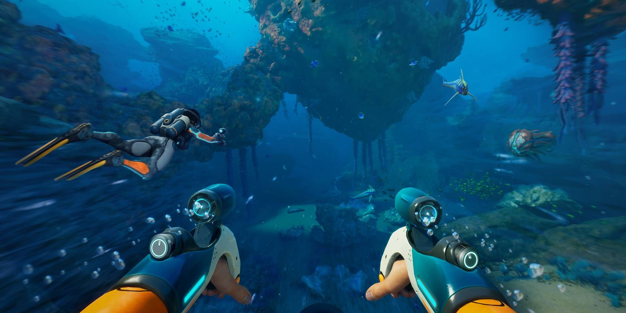 Subnautica - Players swimming together with some fish.