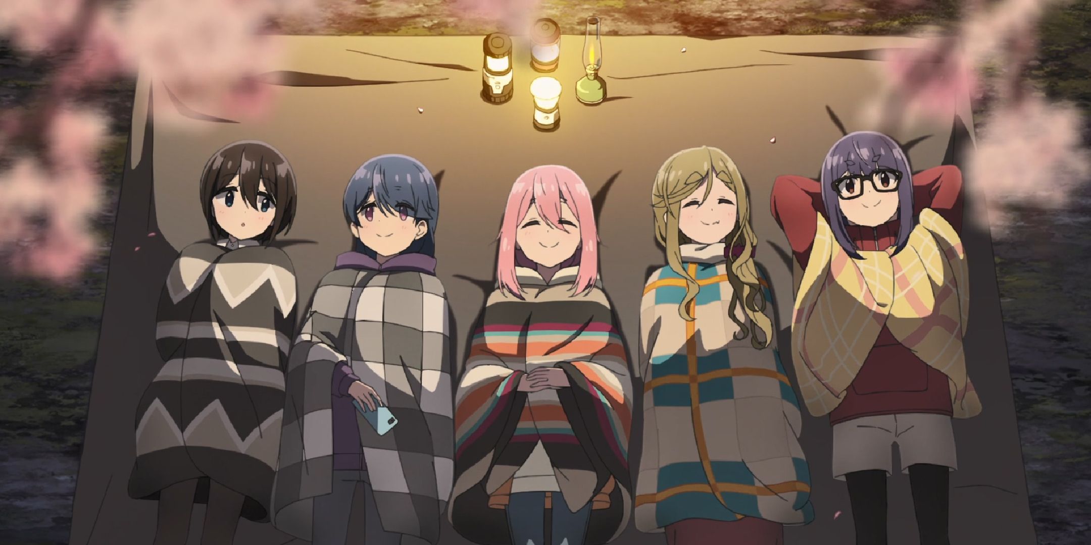 The characters of ​​​​​​​Laid-Back Camp looking at the sky.