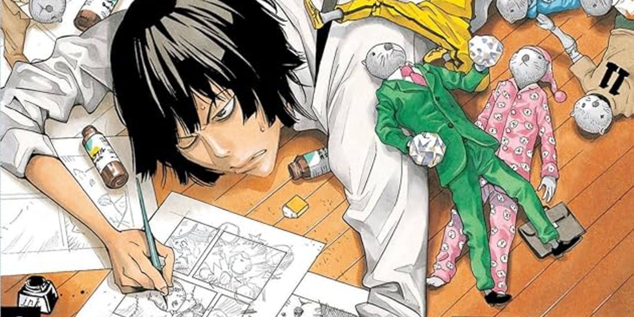 A character from Bakuman drawing on the floor.