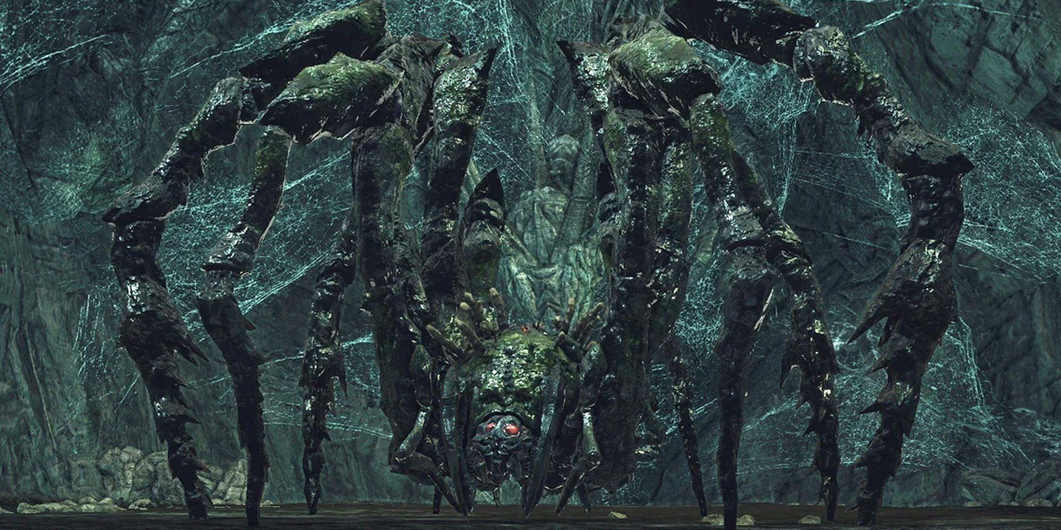 Dark Souls 2 screenshot of the Duke's Dear Freja, a giant spider, lurking in a cave.