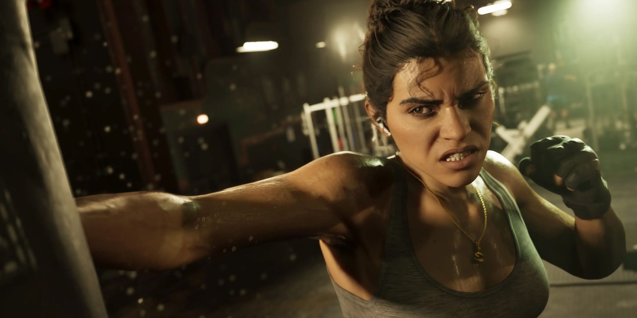 GTA 6 screenshot of Lucia punching a punching bag at the gym.
