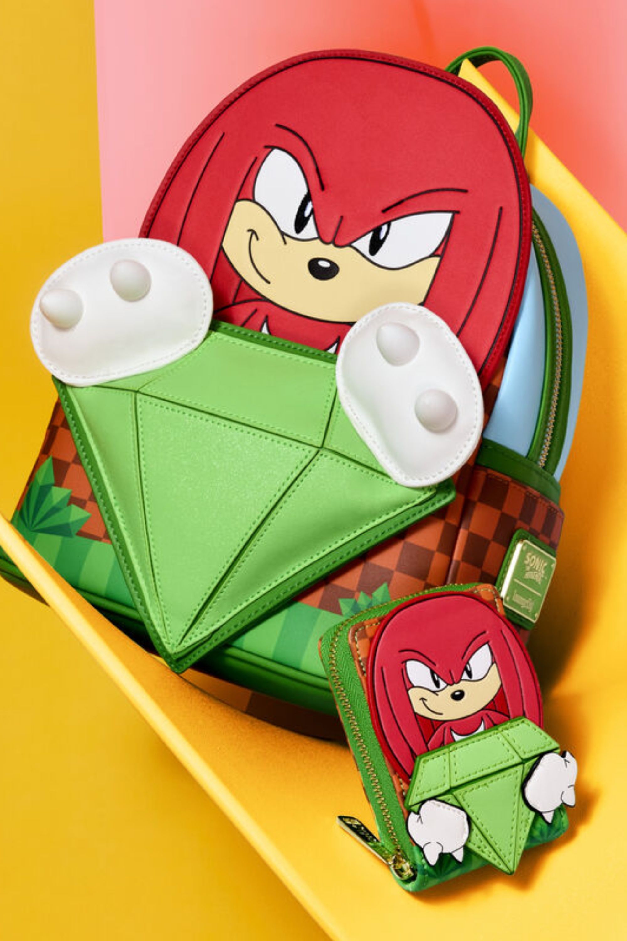 Sonic The Hedgehog Limited Edition Knuckles Emerald Glitter Mini Backpack and accordian wallet.