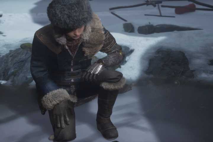 P kneeling in the snow in lies of p overture.