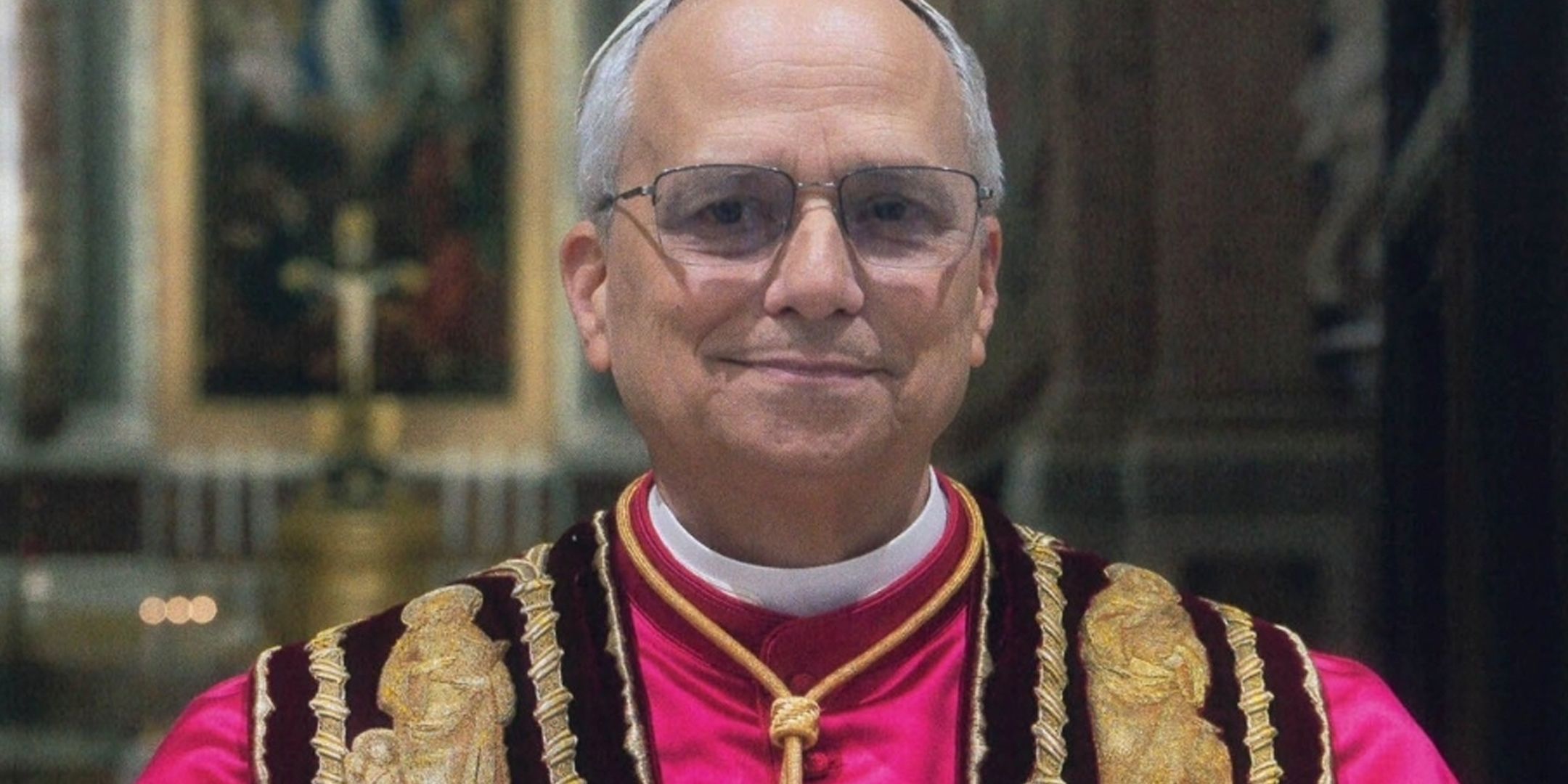 Pope Leo 14 smiling at the camera.