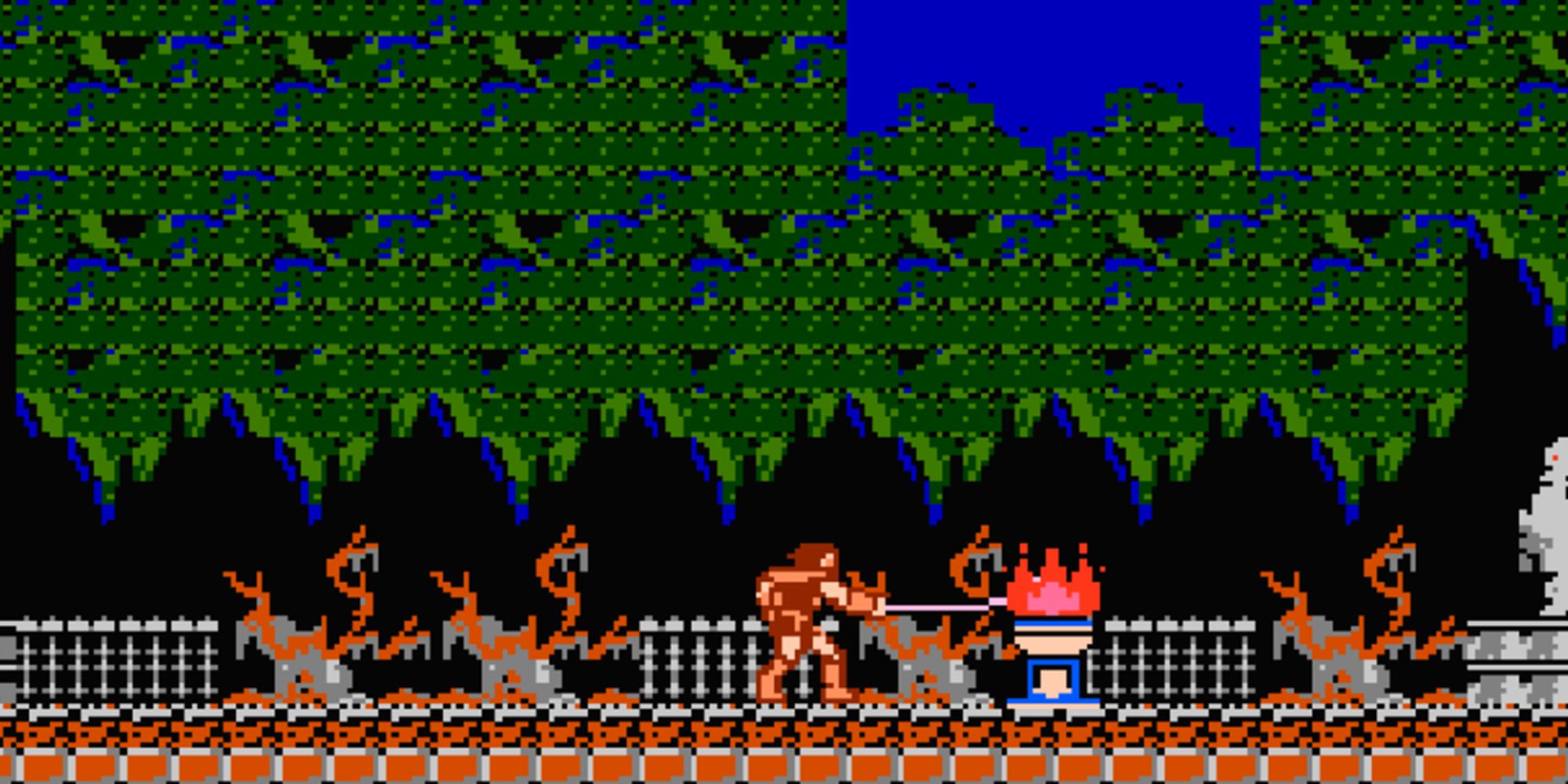 Simon whips a torch in Castlevania.