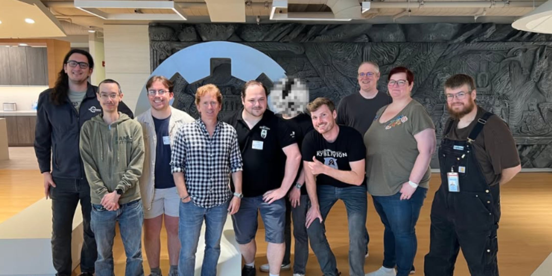 The Skyblivion developers posing with Bethesda developers at the Bethesda office