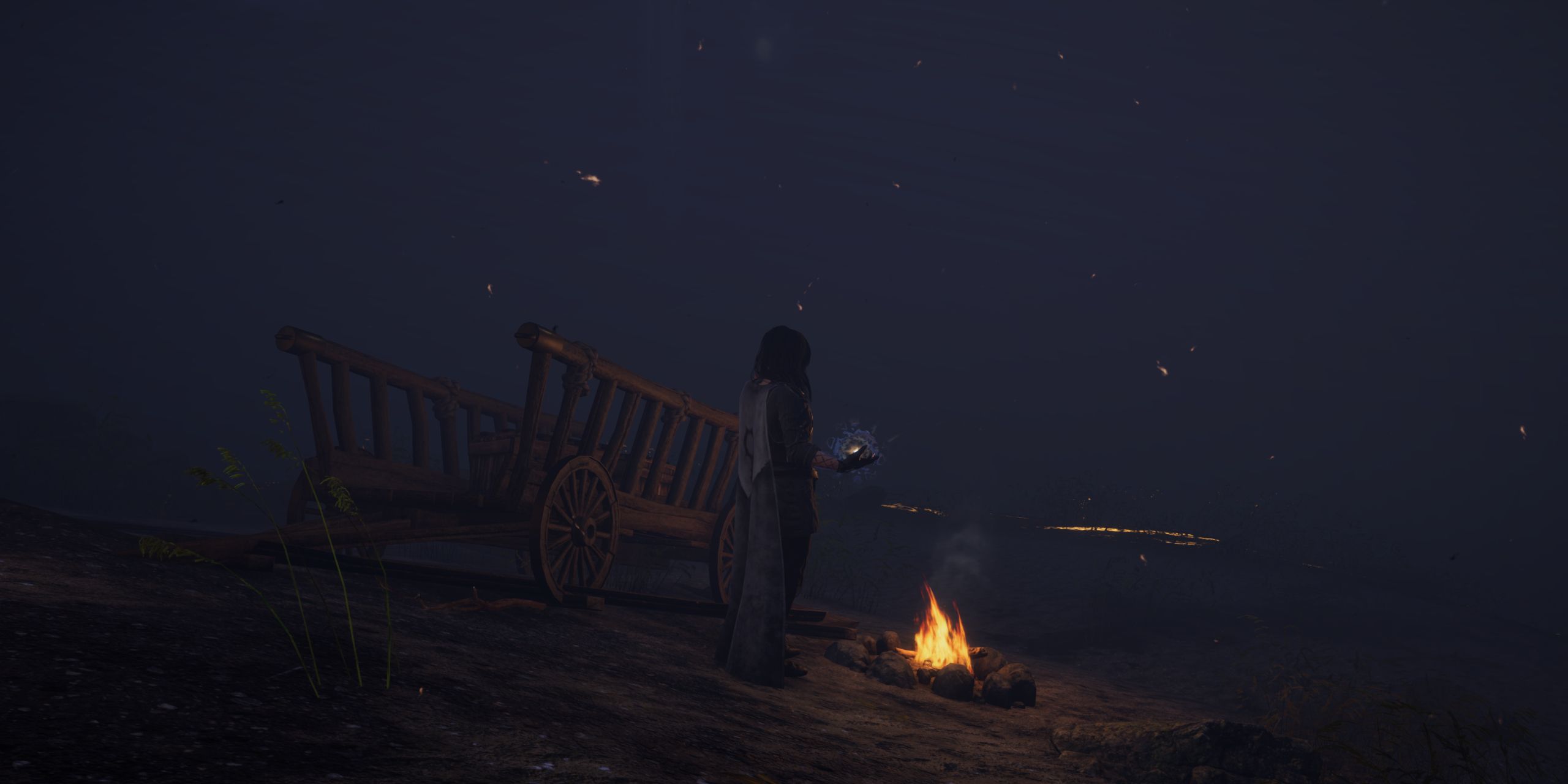 The main character resting in a bonfire at night in Tainted Grail: The Fall Of Avalon.
