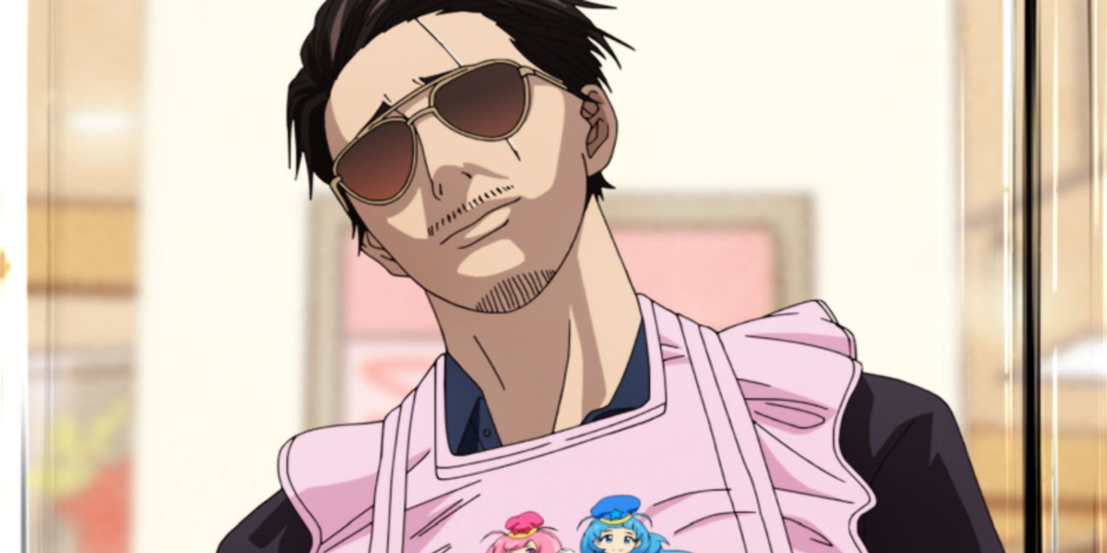 Tatsu leaning back in an apron from The Way Of The Househusband.