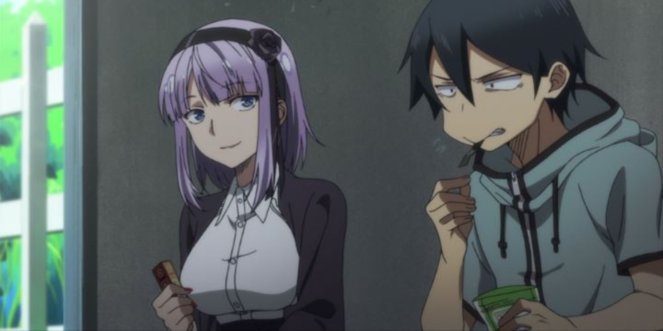 The two main characters from Dagashi kashi sitting together.