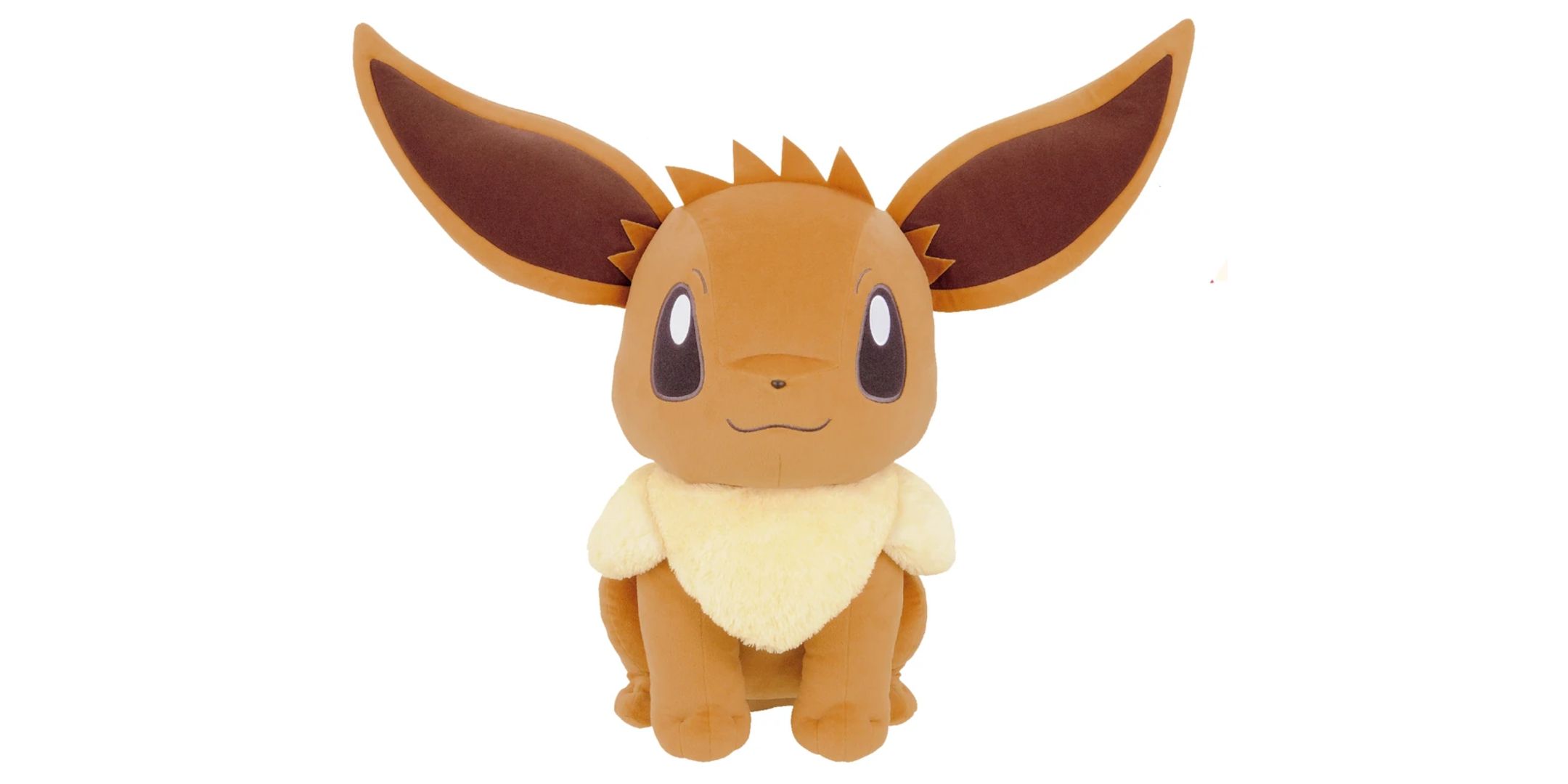 A giant eevee plush on a white background.