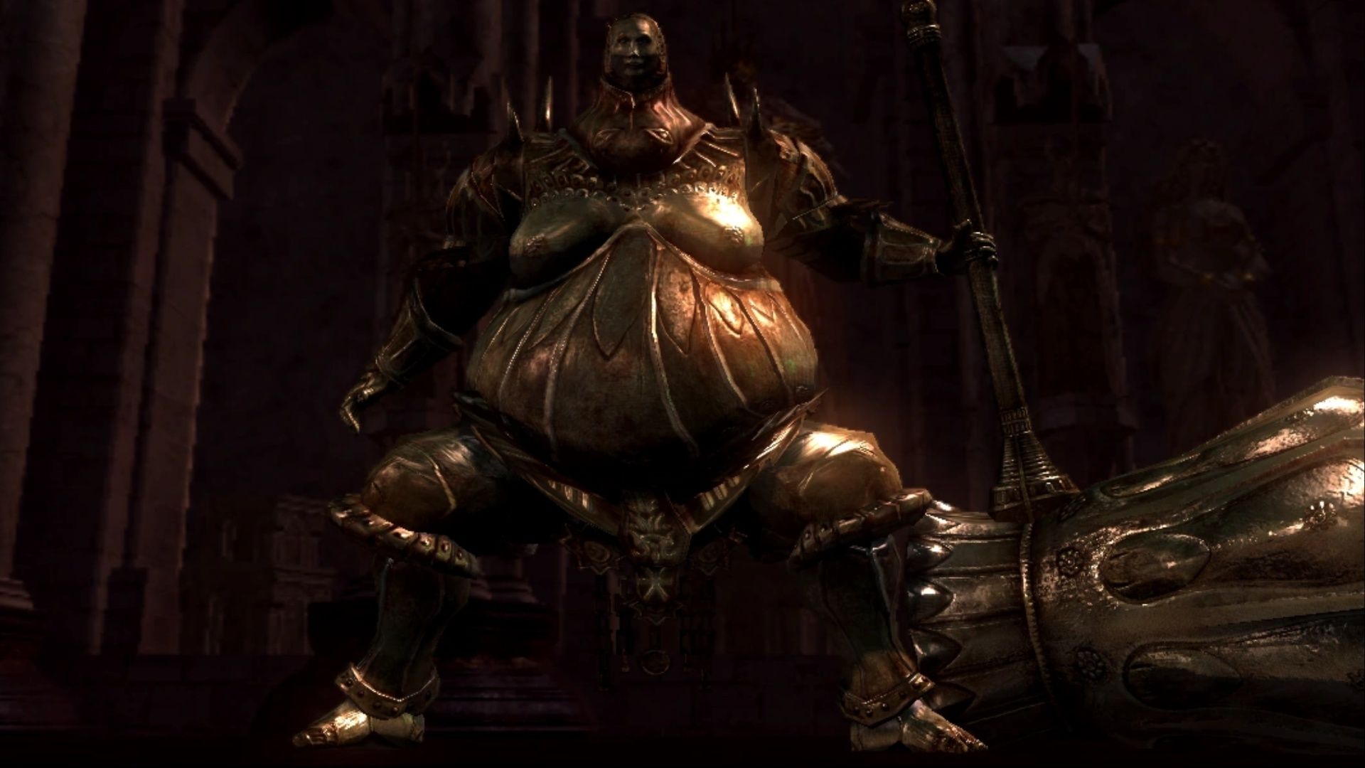 Smough standing menacingly inside the ballroom of Anor Londo wielding his enormous Great Hammer in Dark Souls.