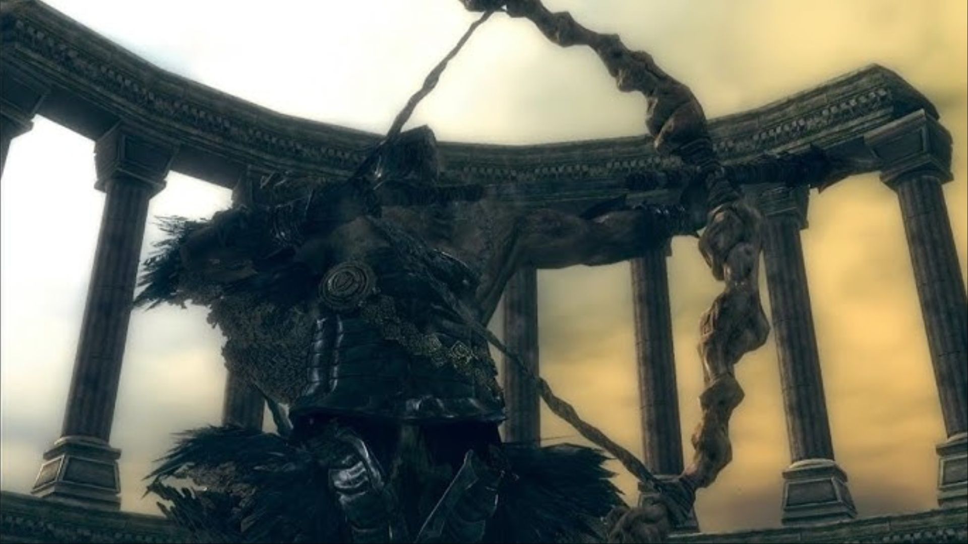Hawkeye Gough drawing his massive Giant's Bow to snipe a flying Black Dragon Kalameet in Dark Souls.